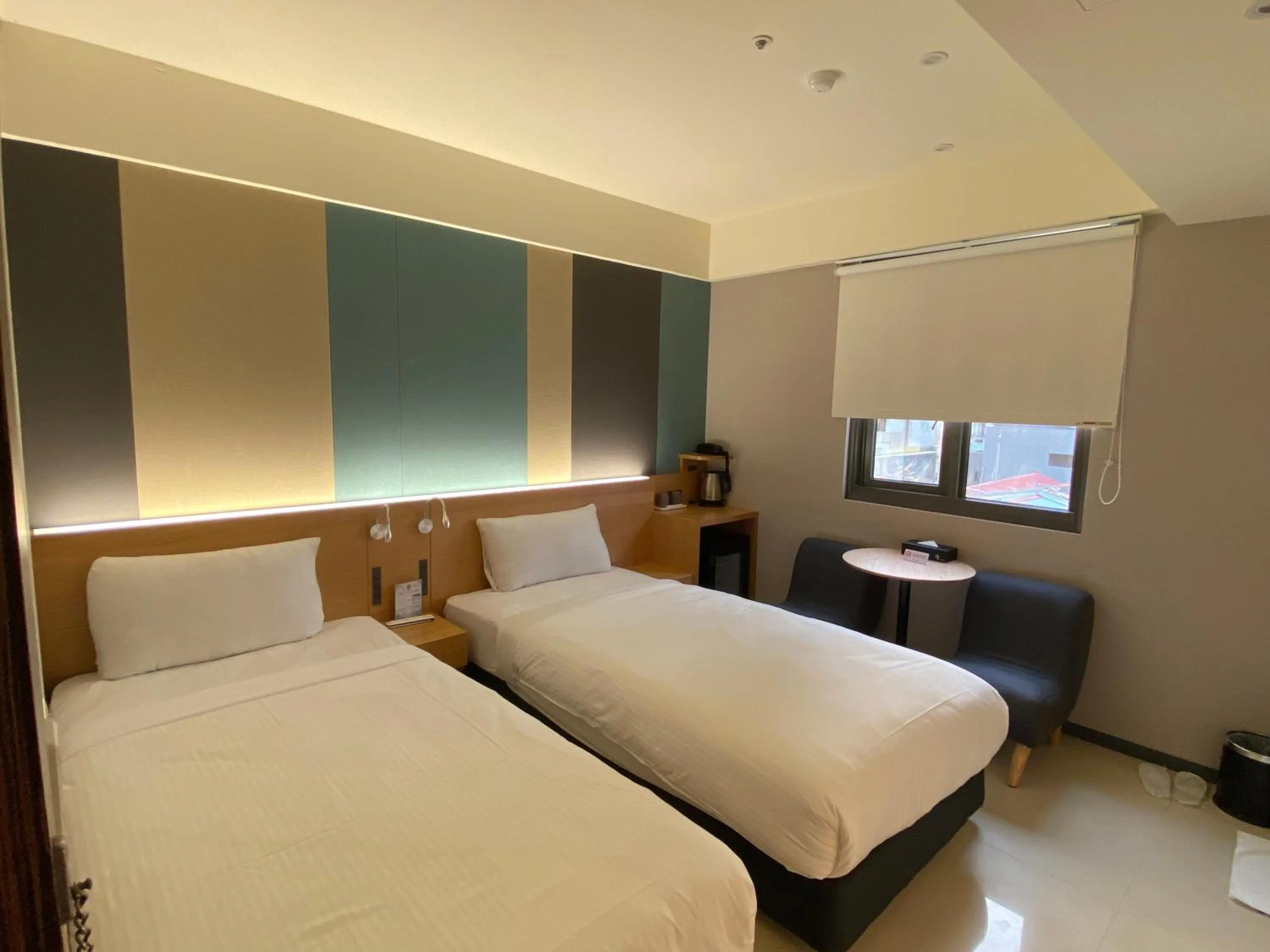 Photo of the whole room, Bed in Fu Kuang Hotel