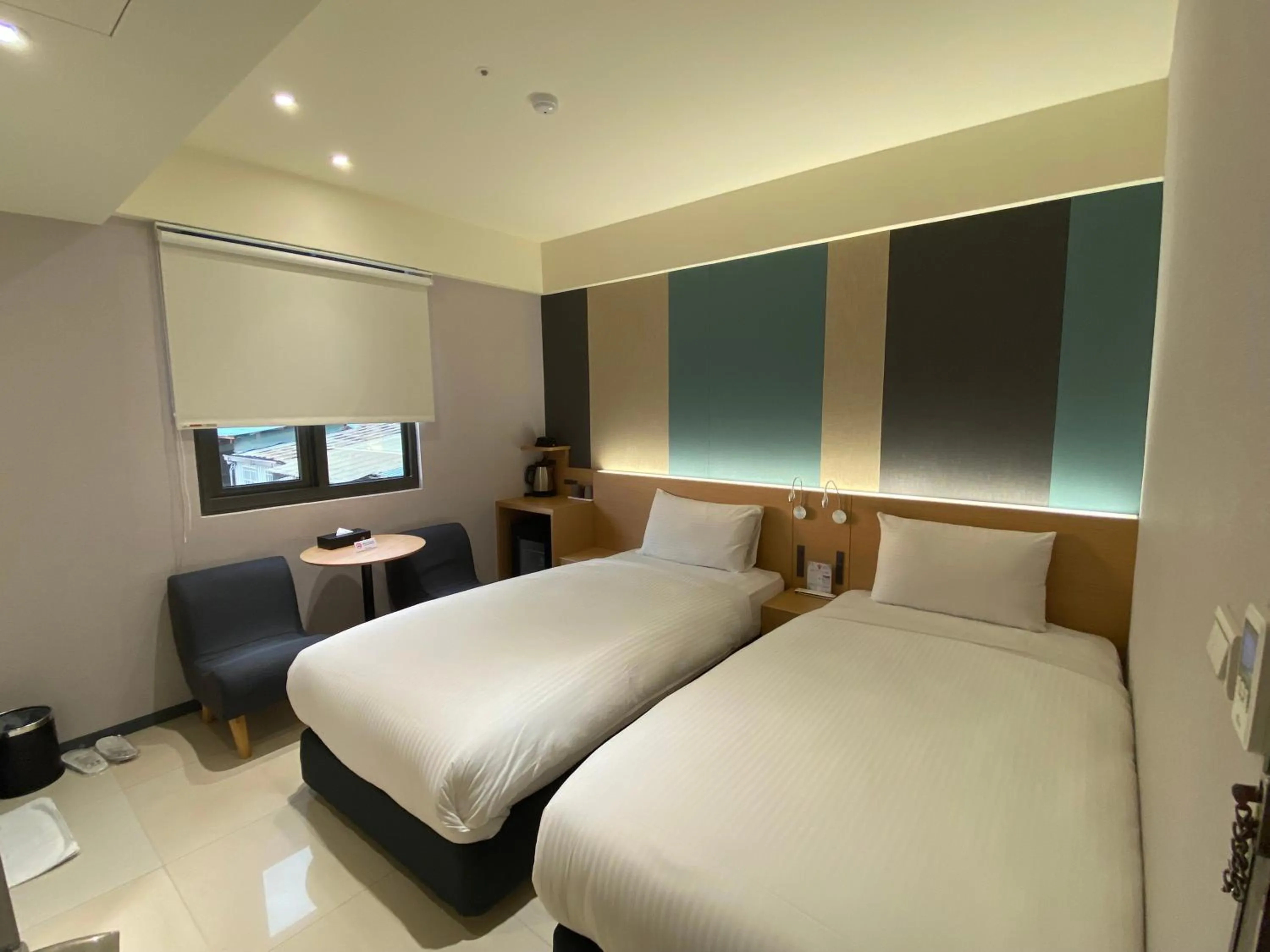 Photo of the whole room, Bed in Fu Kuang Hotel