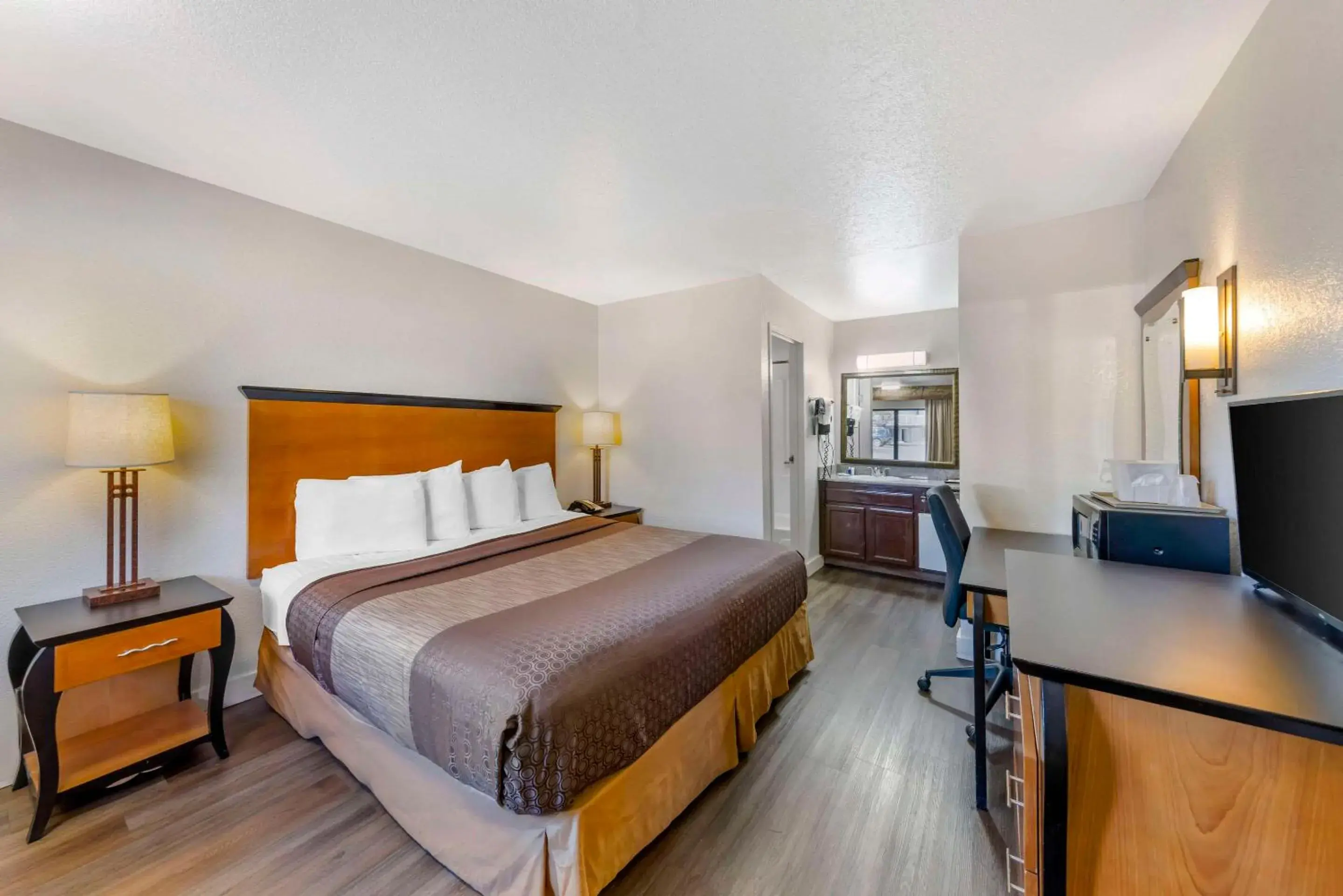 Bedroom, Bed in Rodeway Inn at Nevada State Capitol Bedroom, Bed in Rodeway Inn at Nevada State Capitol