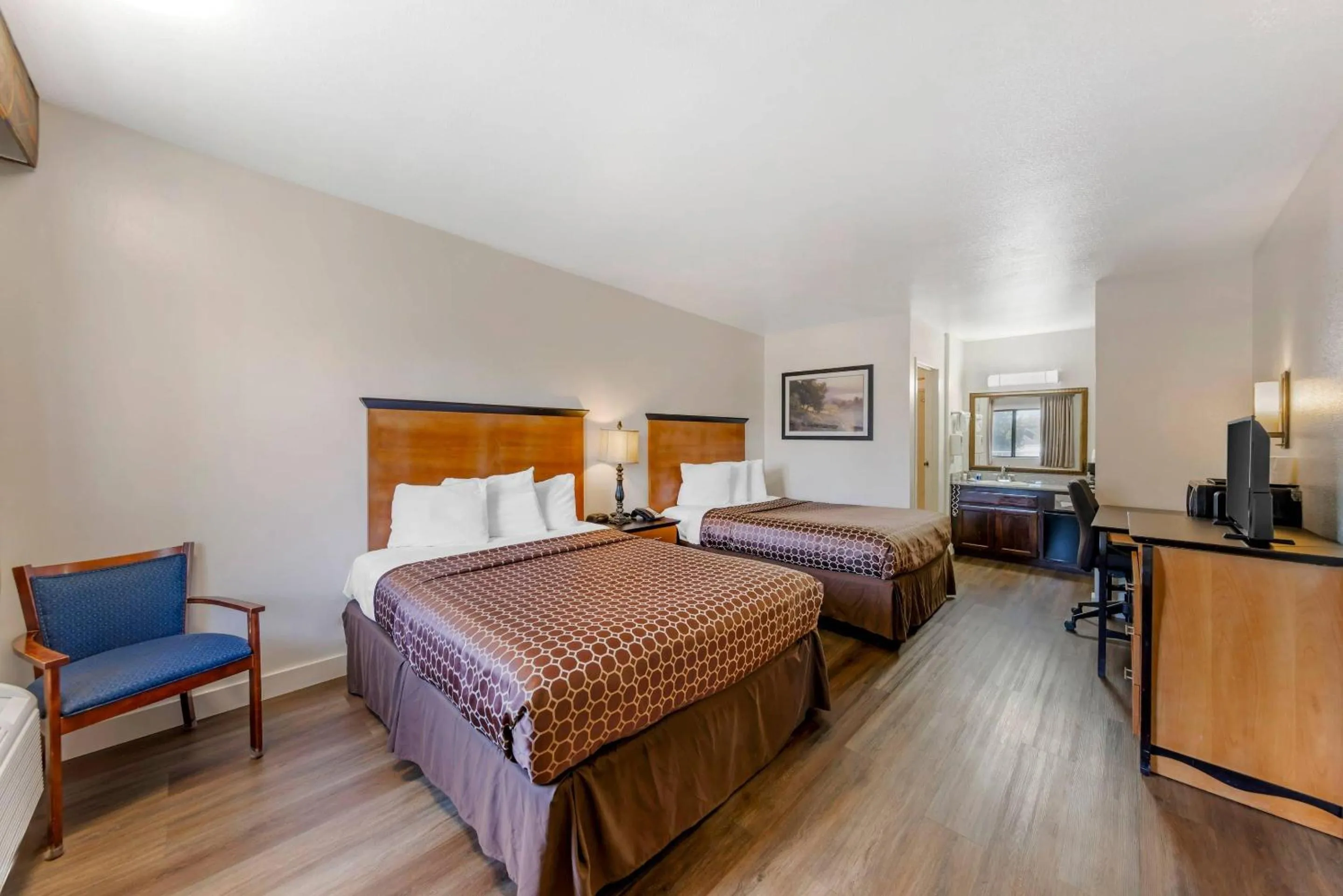 Bedroom, Bed in Rodeway Inn at Nevada State Capitol