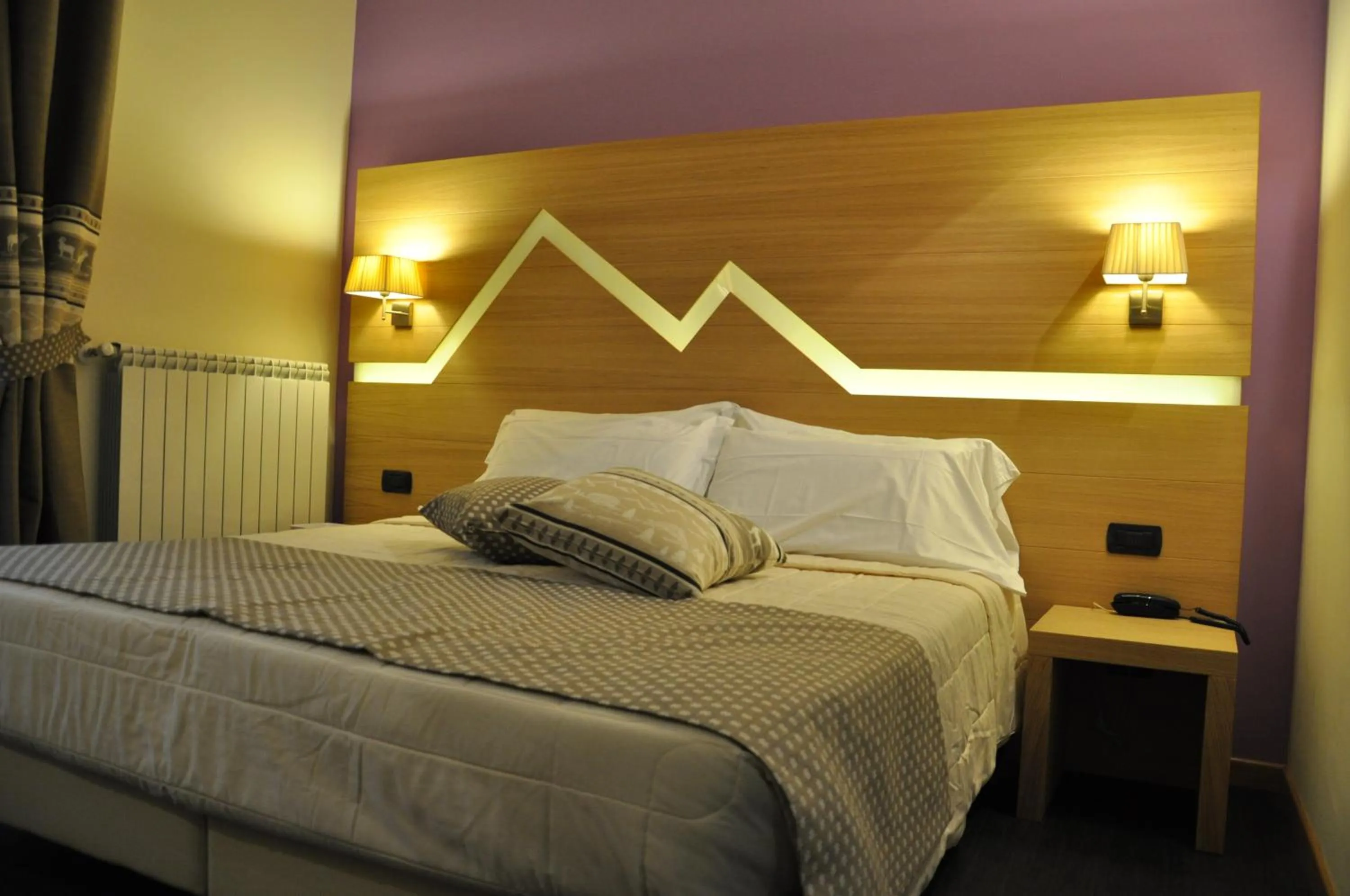 Bed in Hotel Saint Pierre