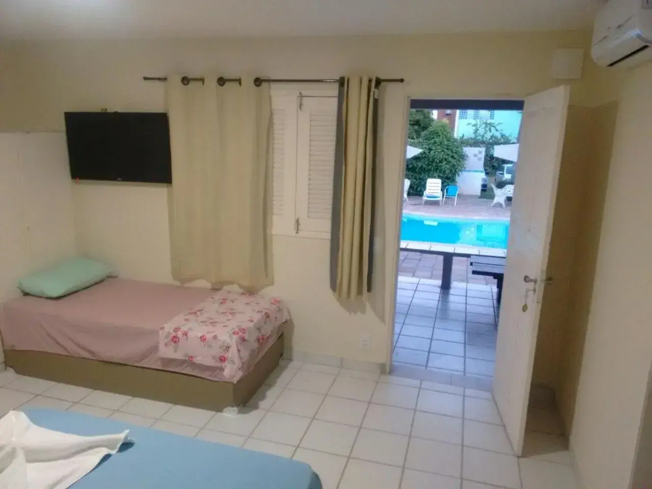 Standard Triple Room in Recanto do Aconchego Standard Triple Room in Recanto do Aconchego