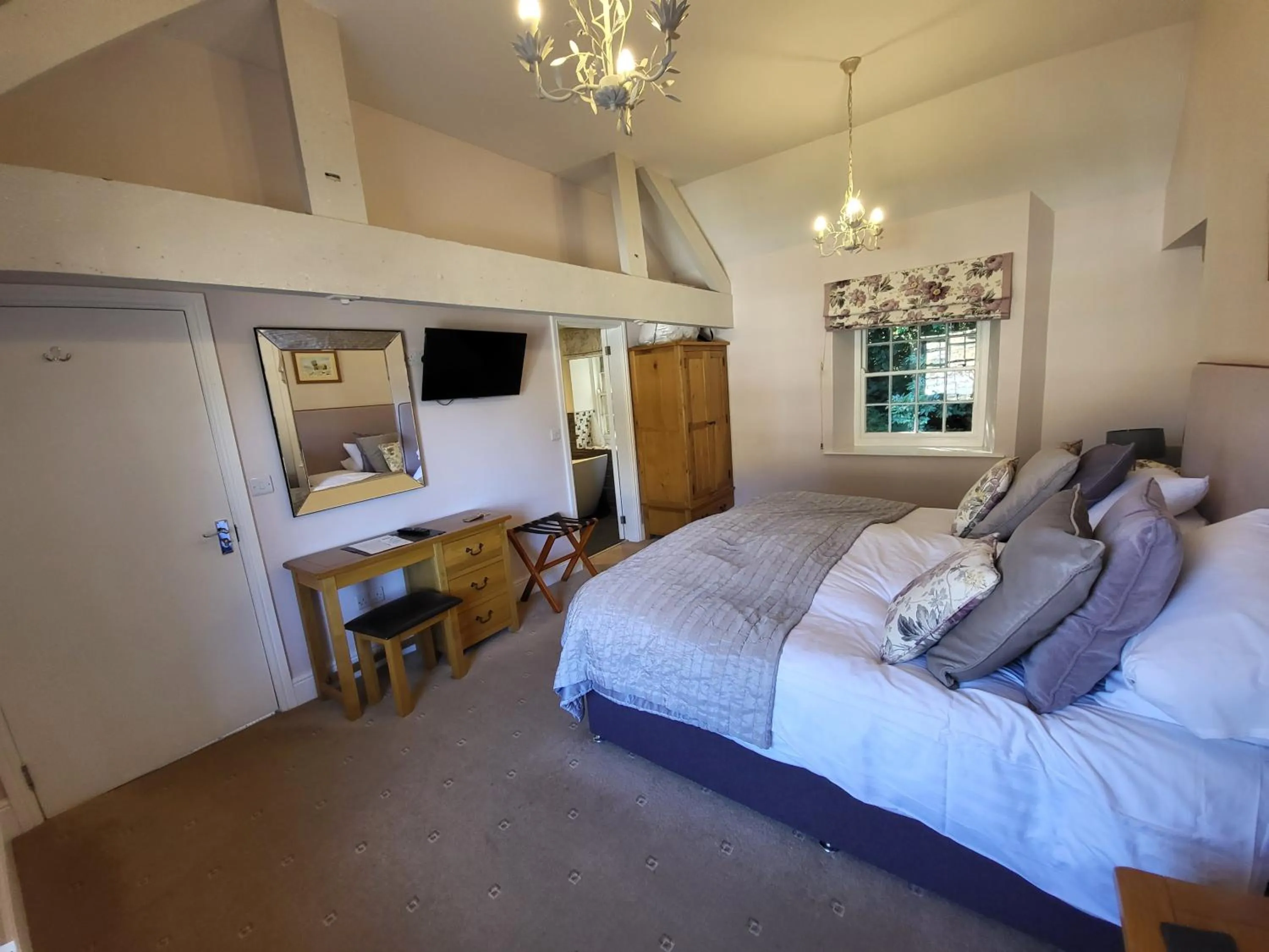 Bed in The Manifold Inn Hotel