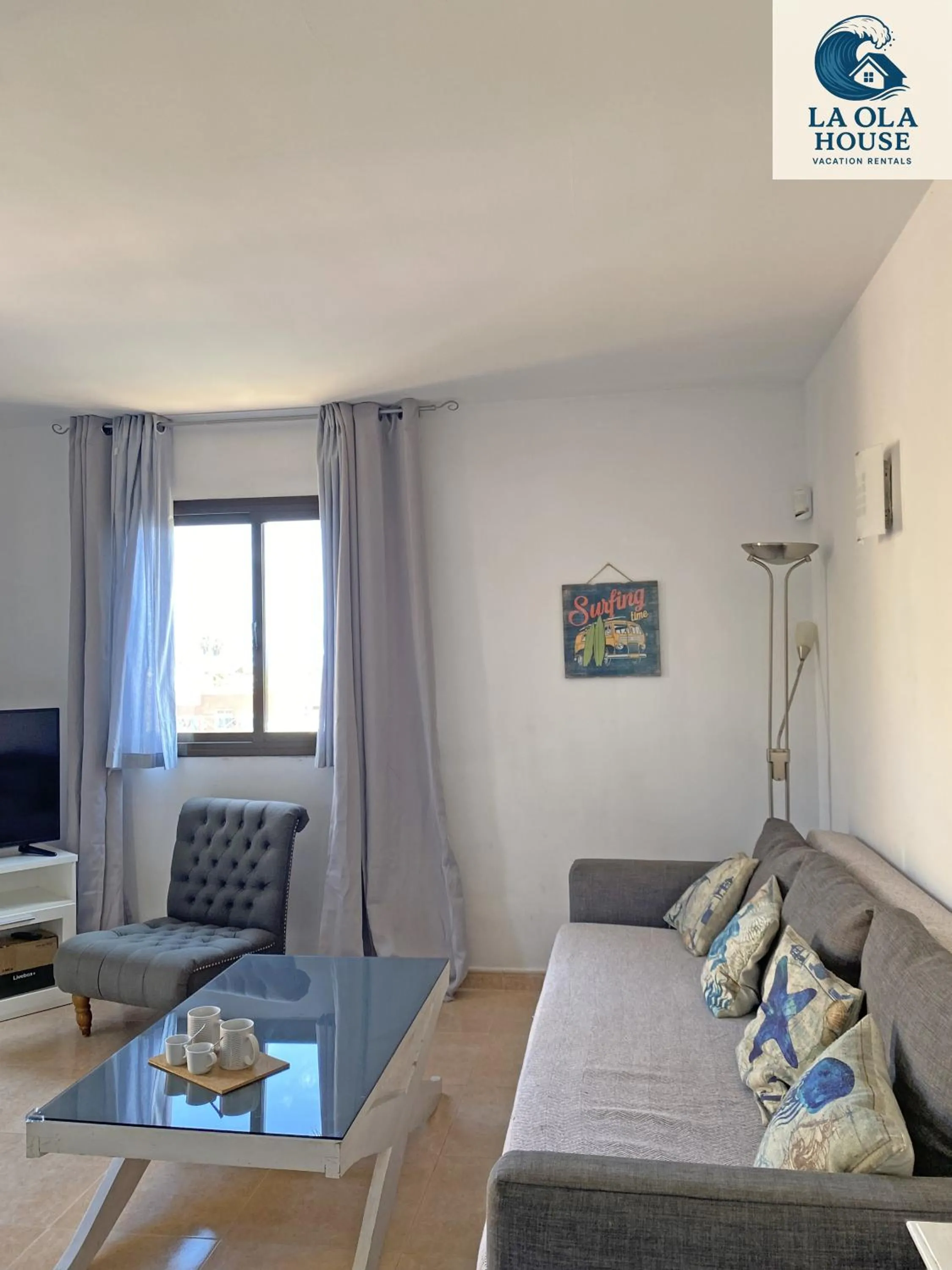 Living room in La Ola House Precioso apartamento con piscina