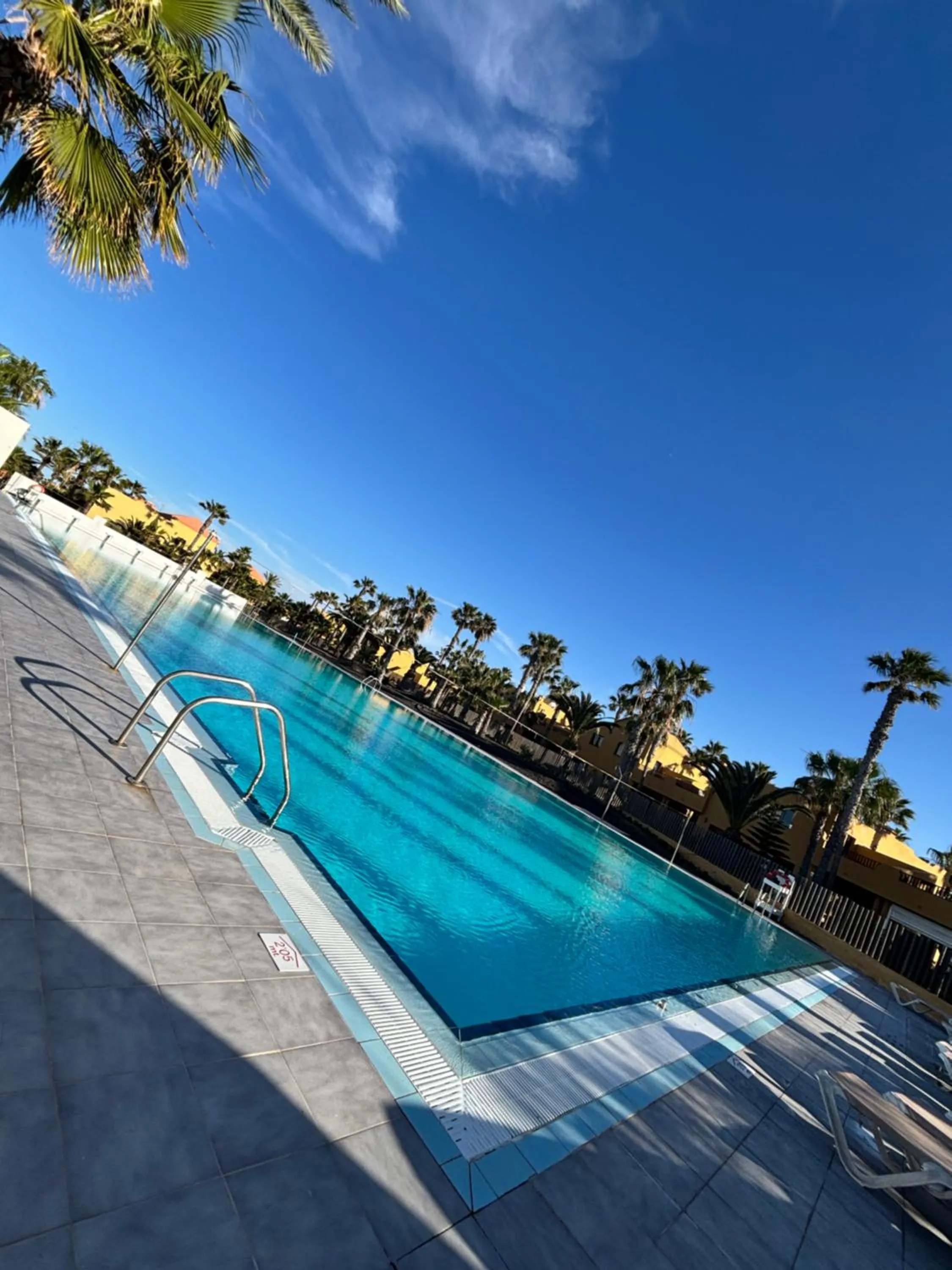 Swimming pool in La Ola House Precioso apartamento con piscina