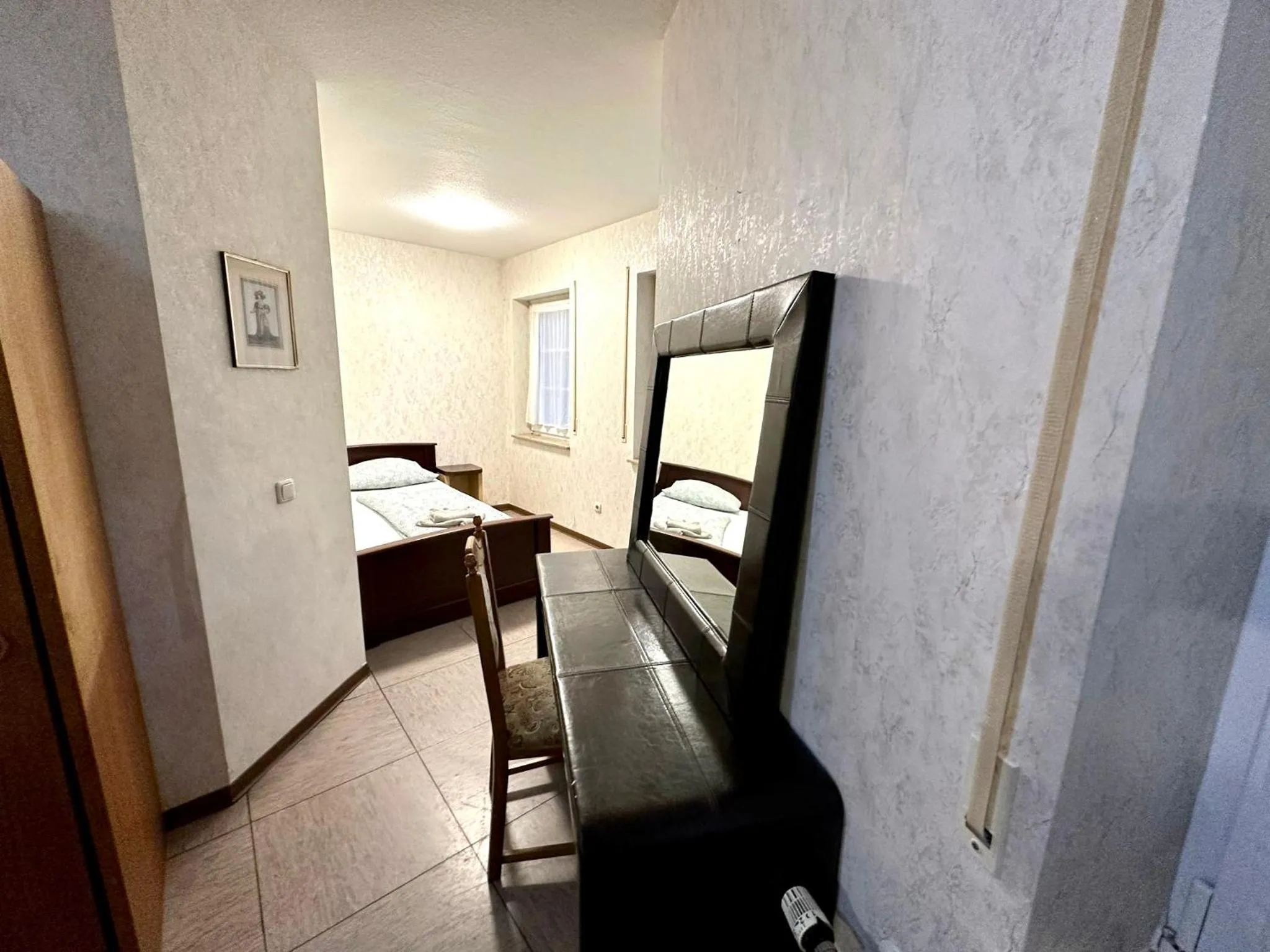 Bed in Hotel Landhaus Köln