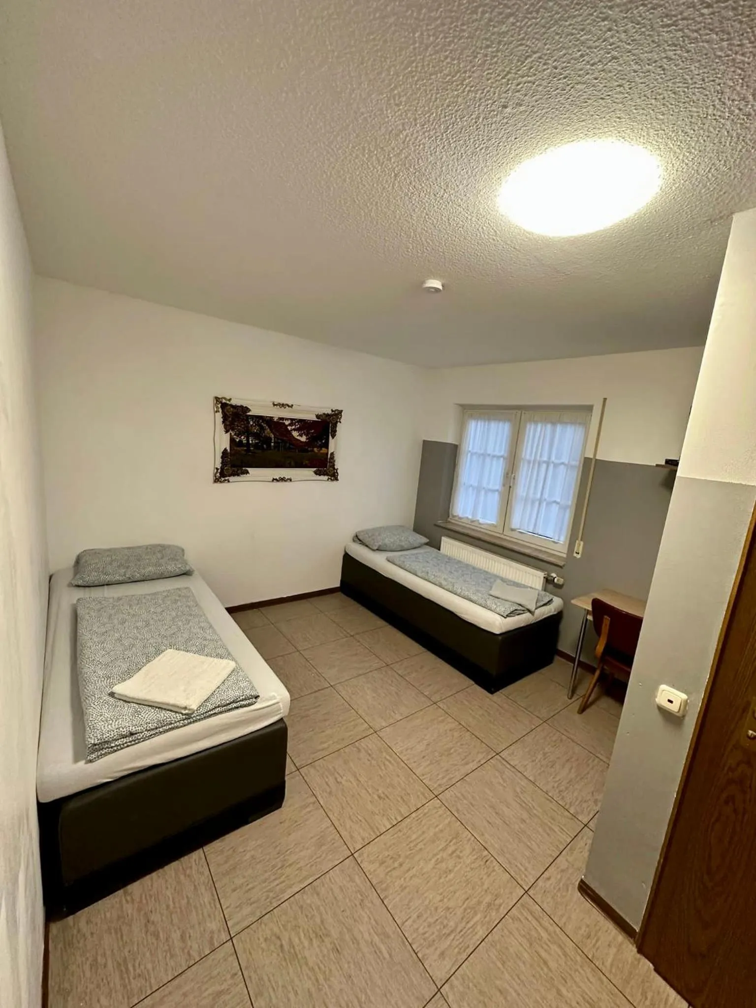 Bed in Hotel Landhaus Köln