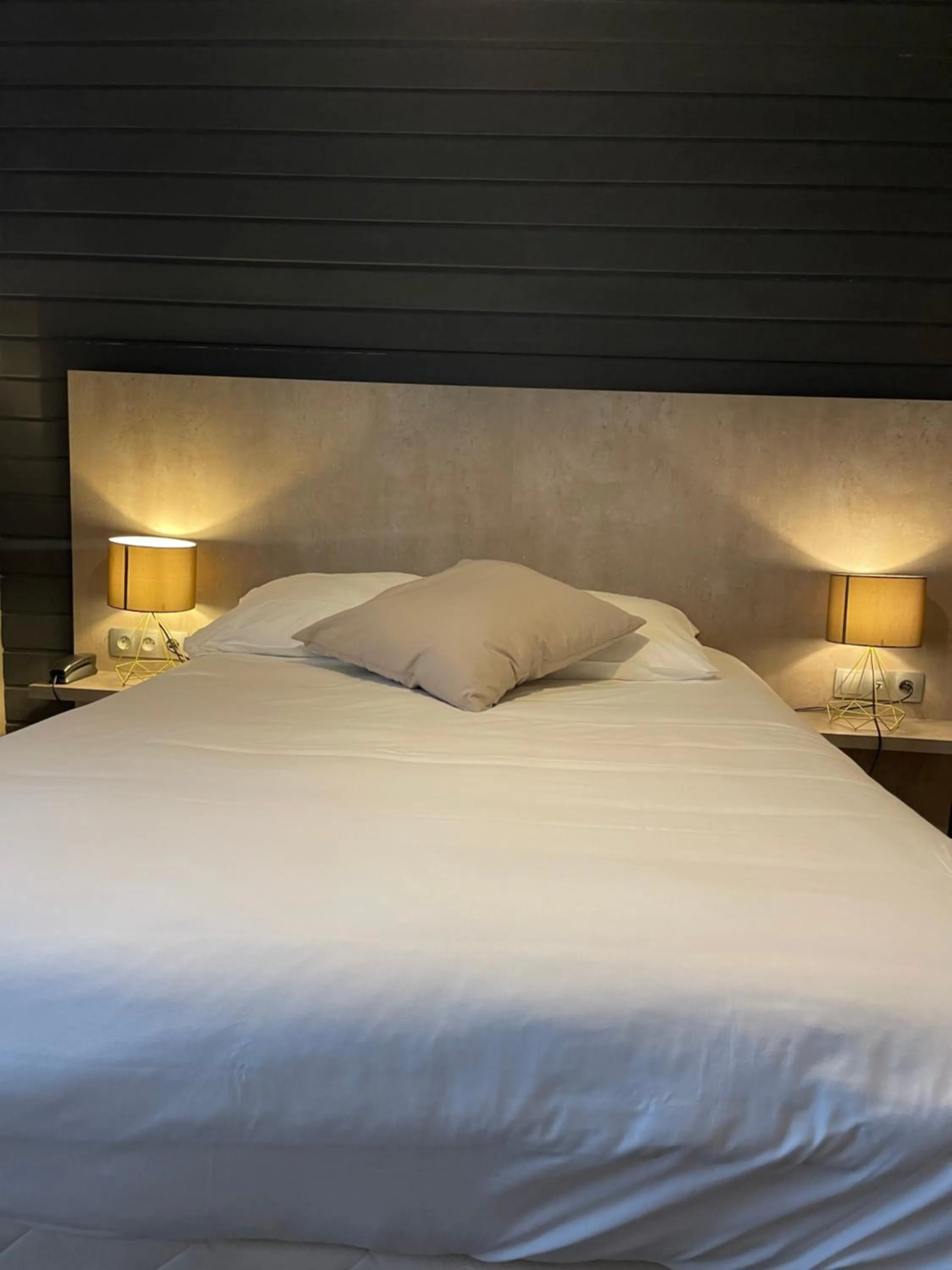 Bed in Hôtel La Réserve