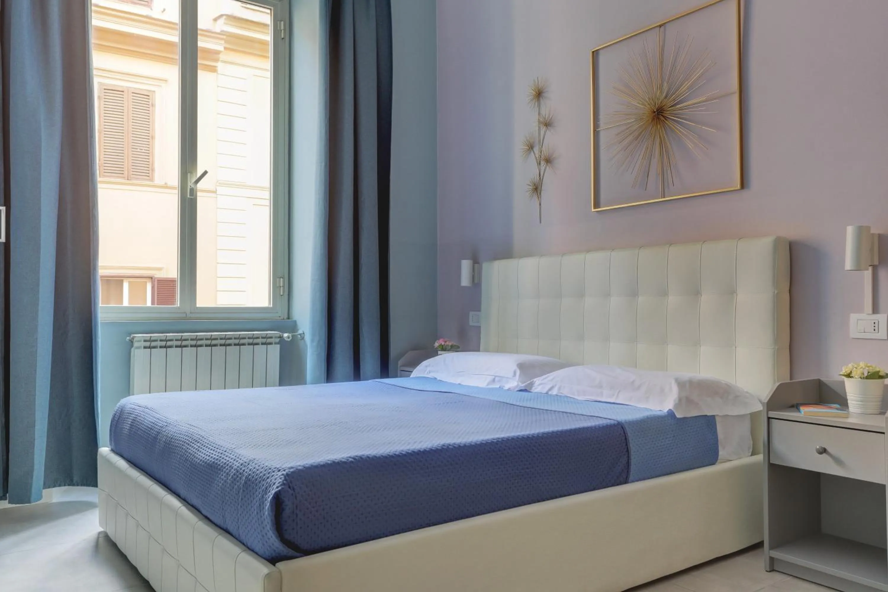 Bed in Claudia House Roma Termini