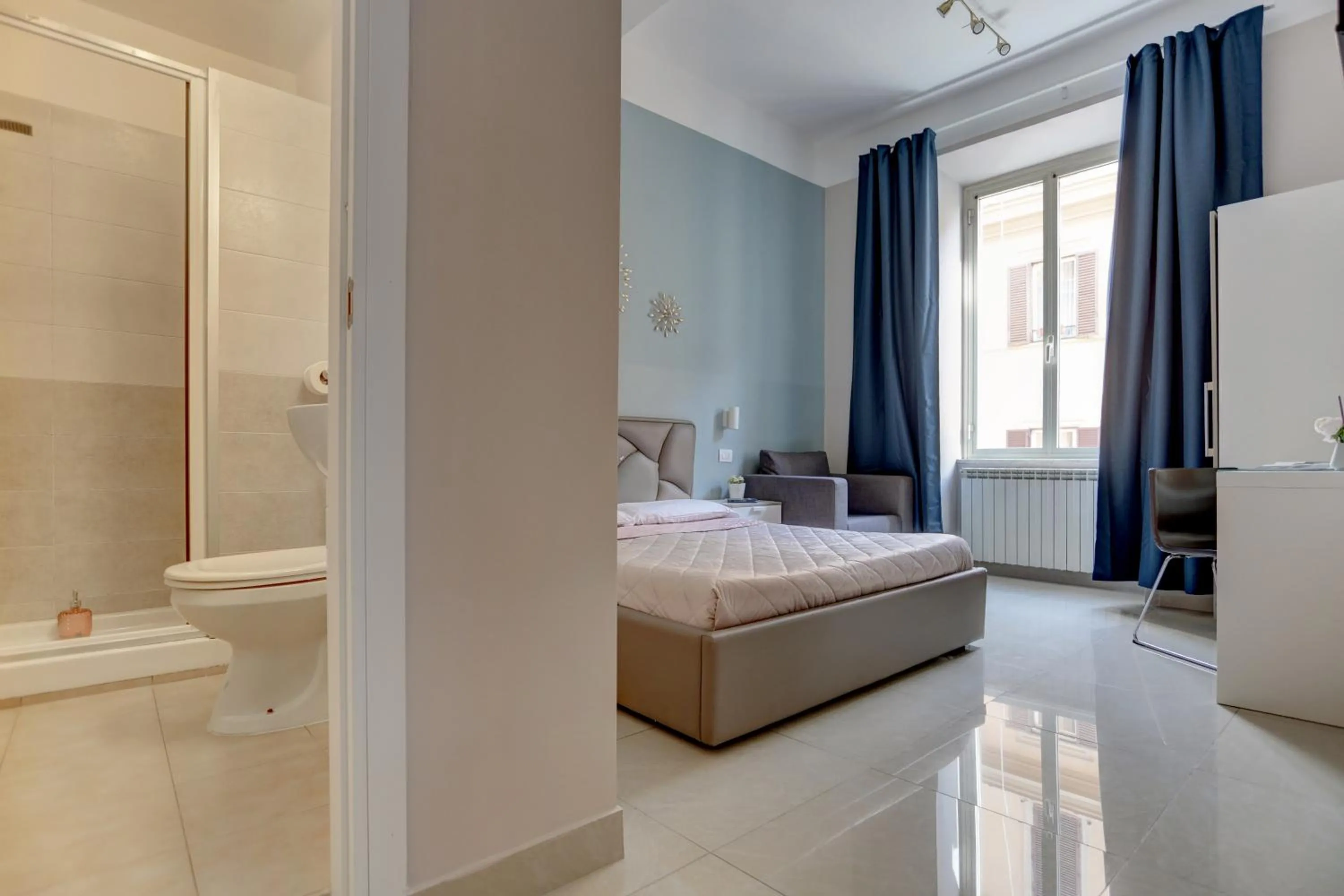 Bed in Claudia House Roma Termini