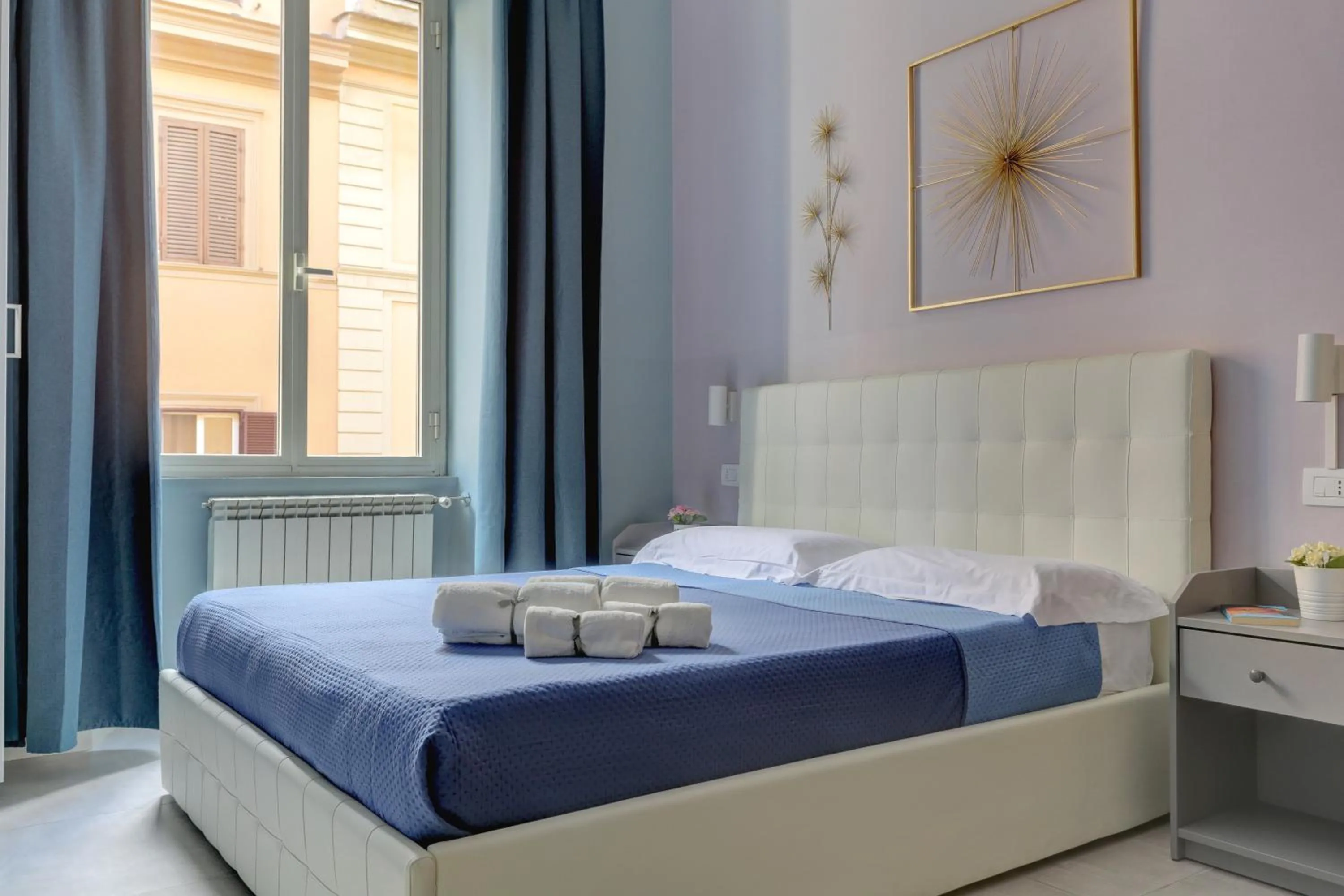 Bed in Claudia House Roma Termini