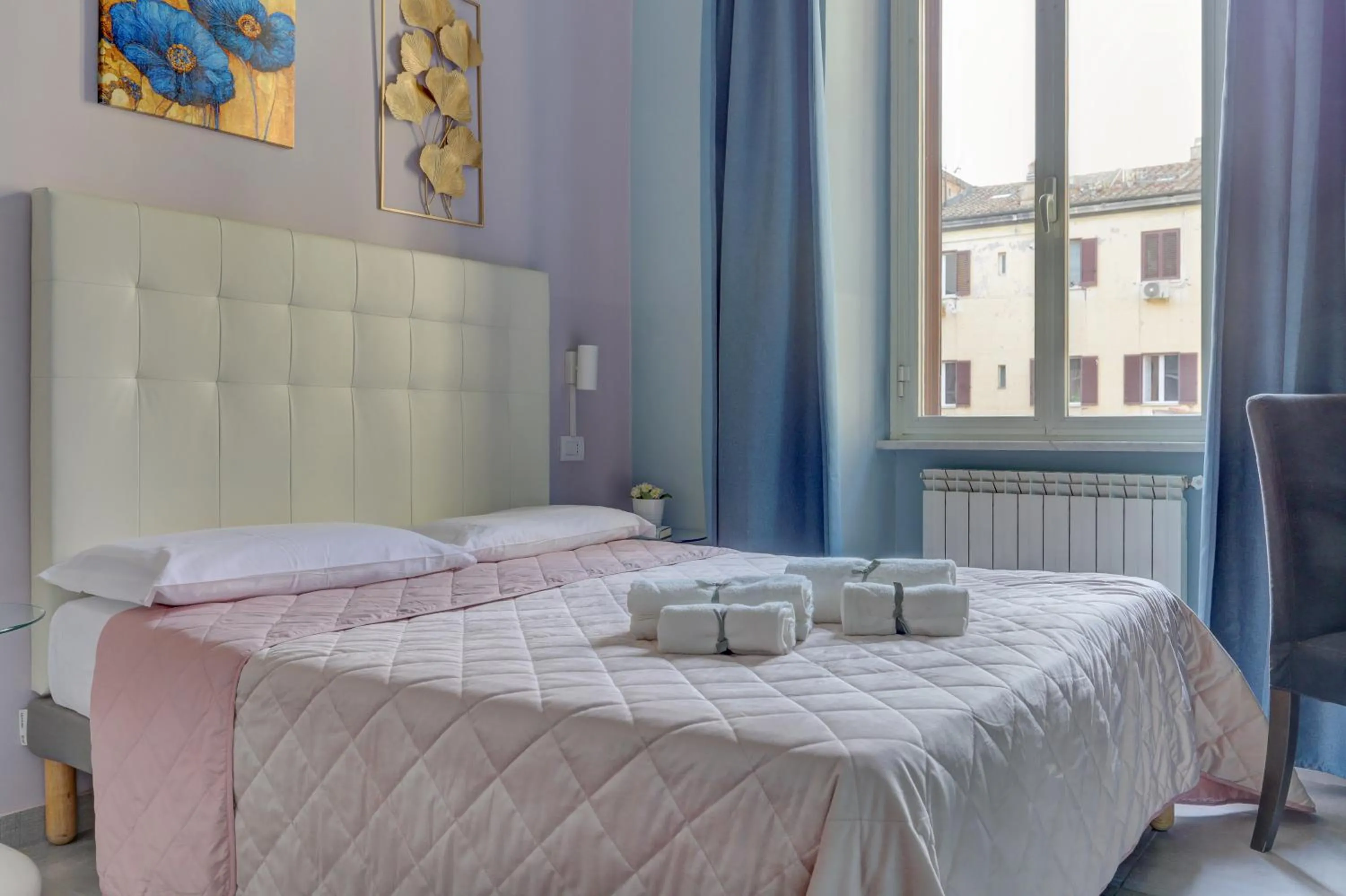 Bed in Claudia House Roma Termini