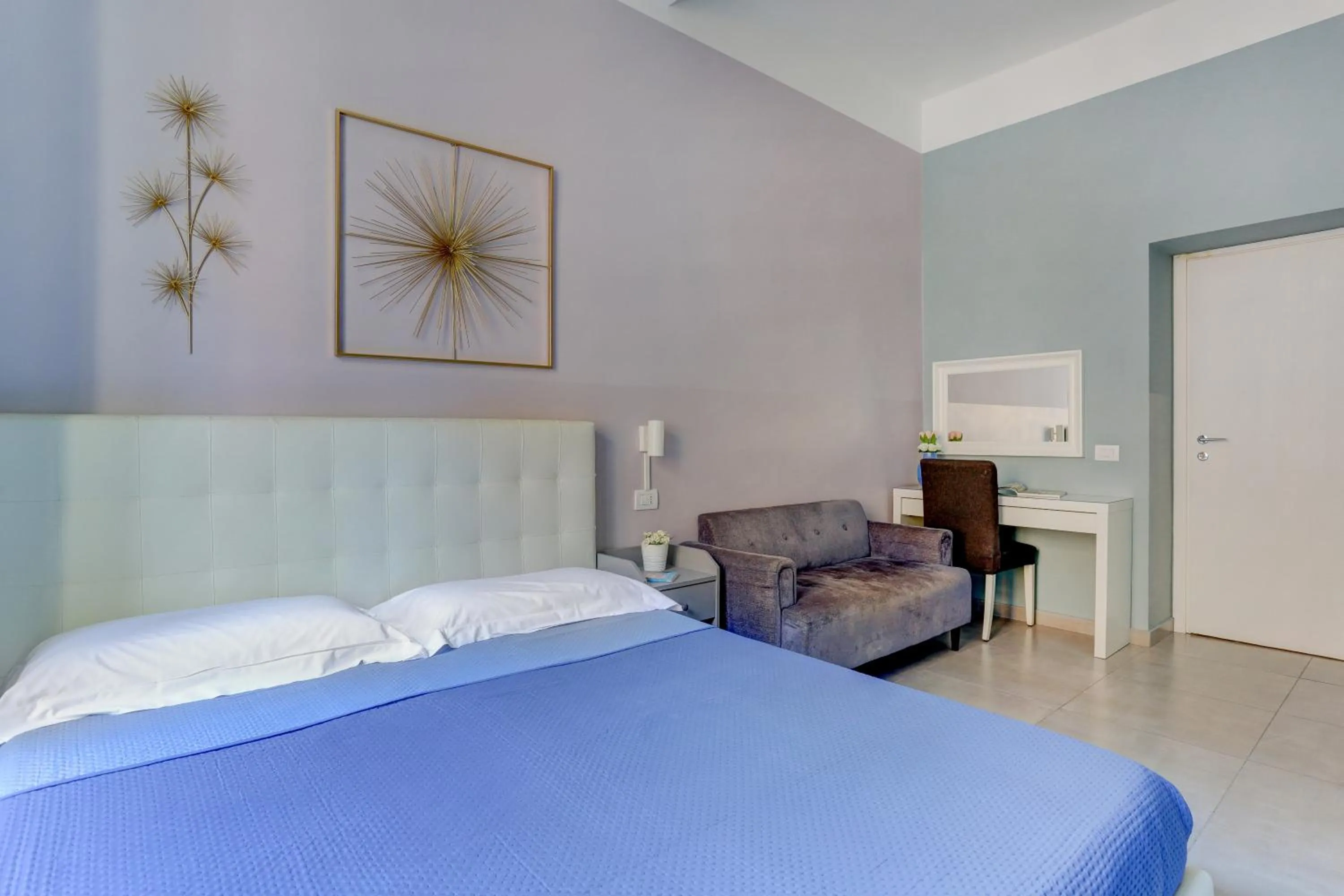 Bed in Claudia House Roma Termini