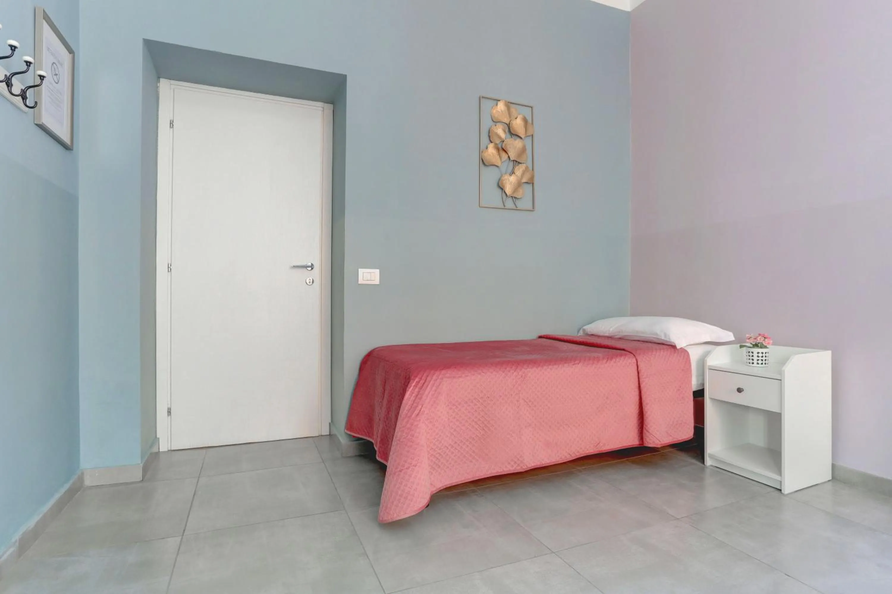 Bed in Claudia House Roma Termini