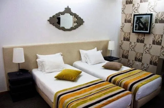 Photo of the whole room, Bed in Paredes Design Hotel