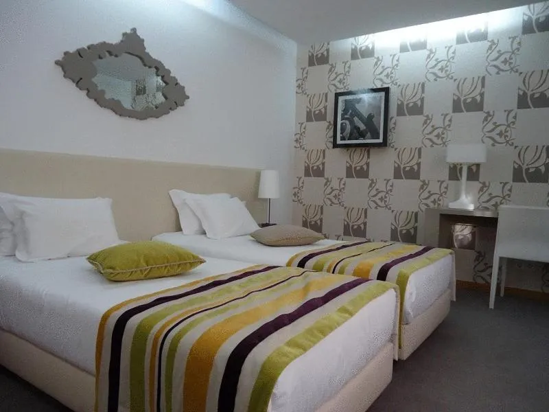 Bed in Paredes Design Hotel