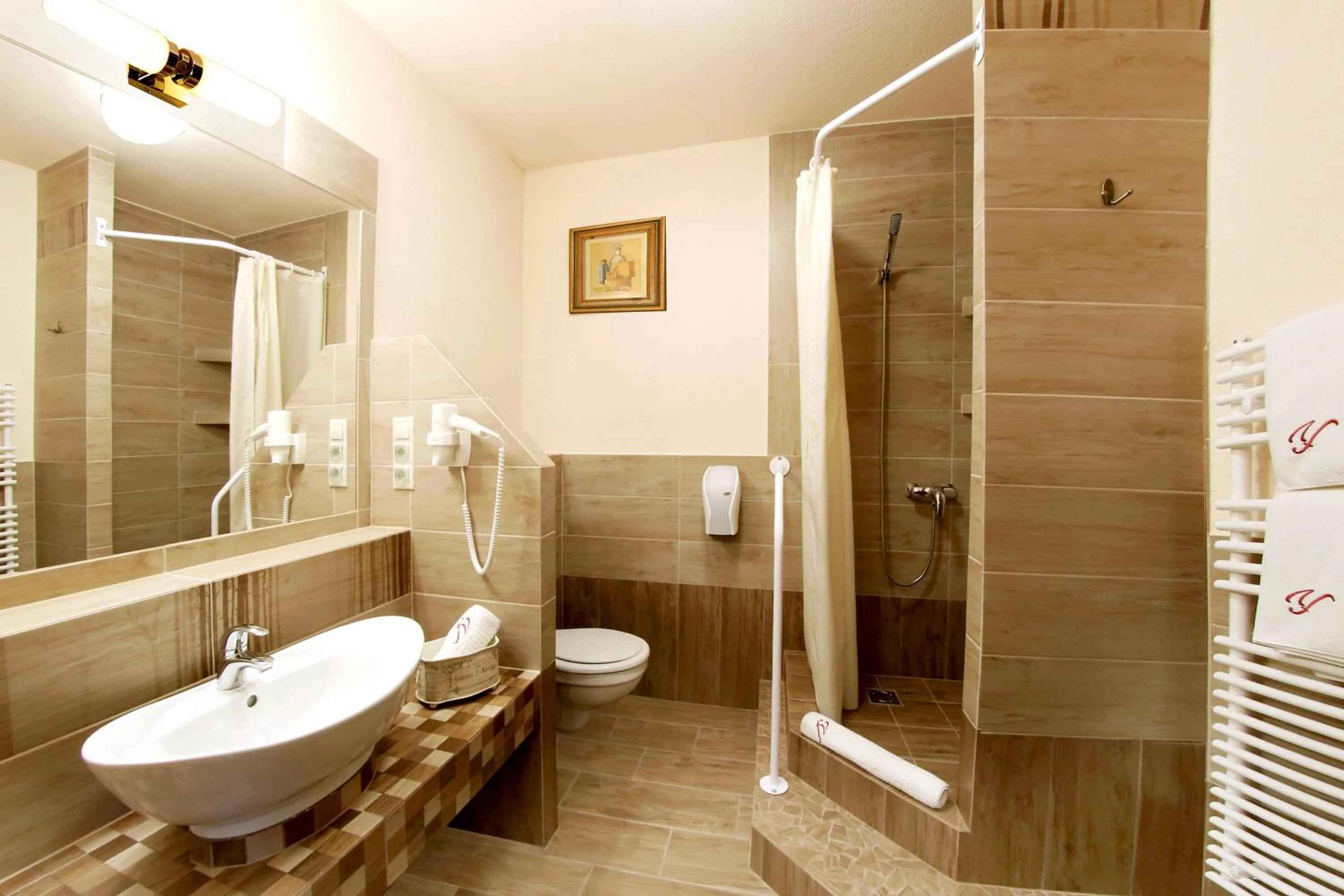 Bathroom in Família Vendégház