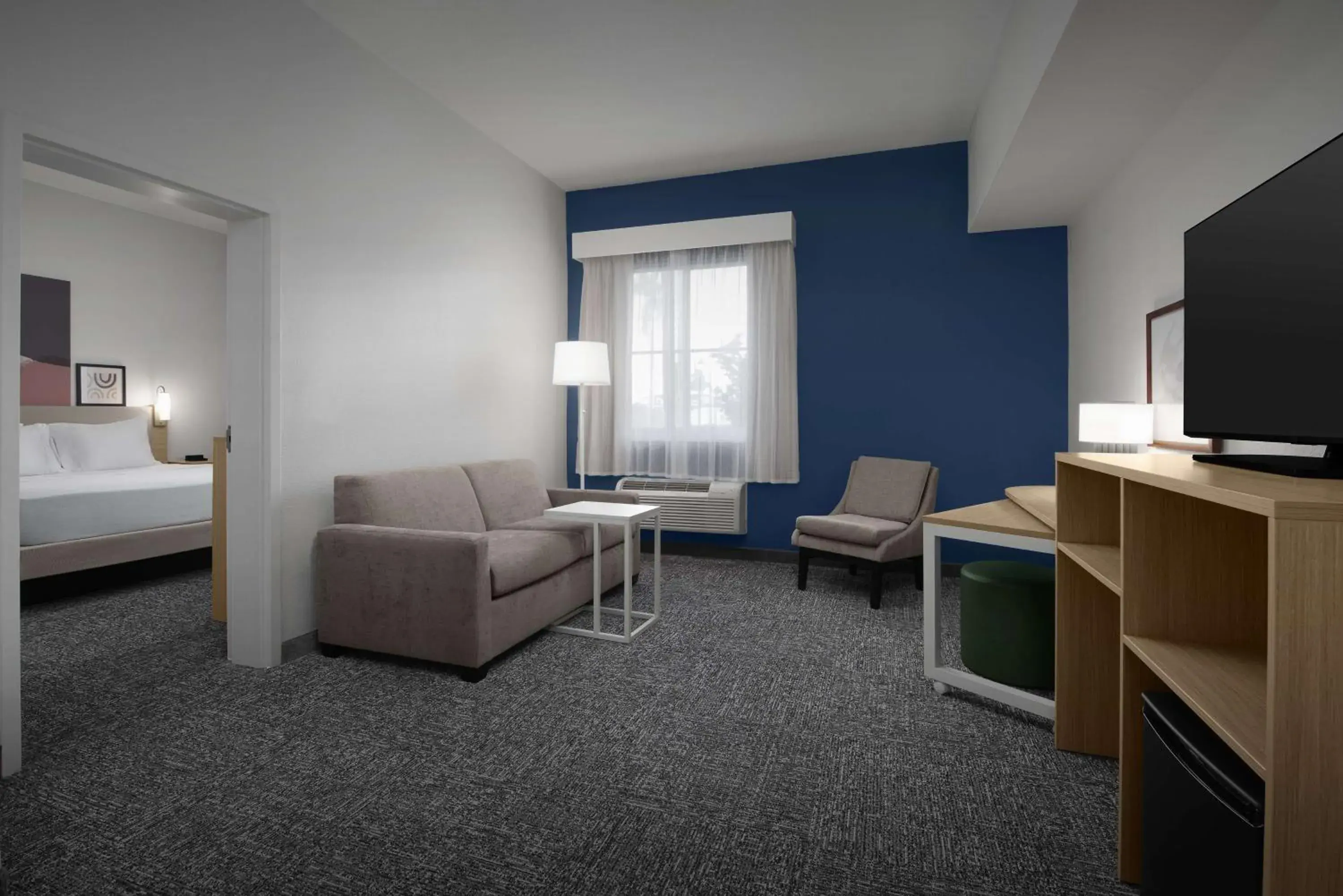 Living room, Bed in Spark by Hilton Miami Doral Living room, Bed in Spark by Hilton Miami Doral