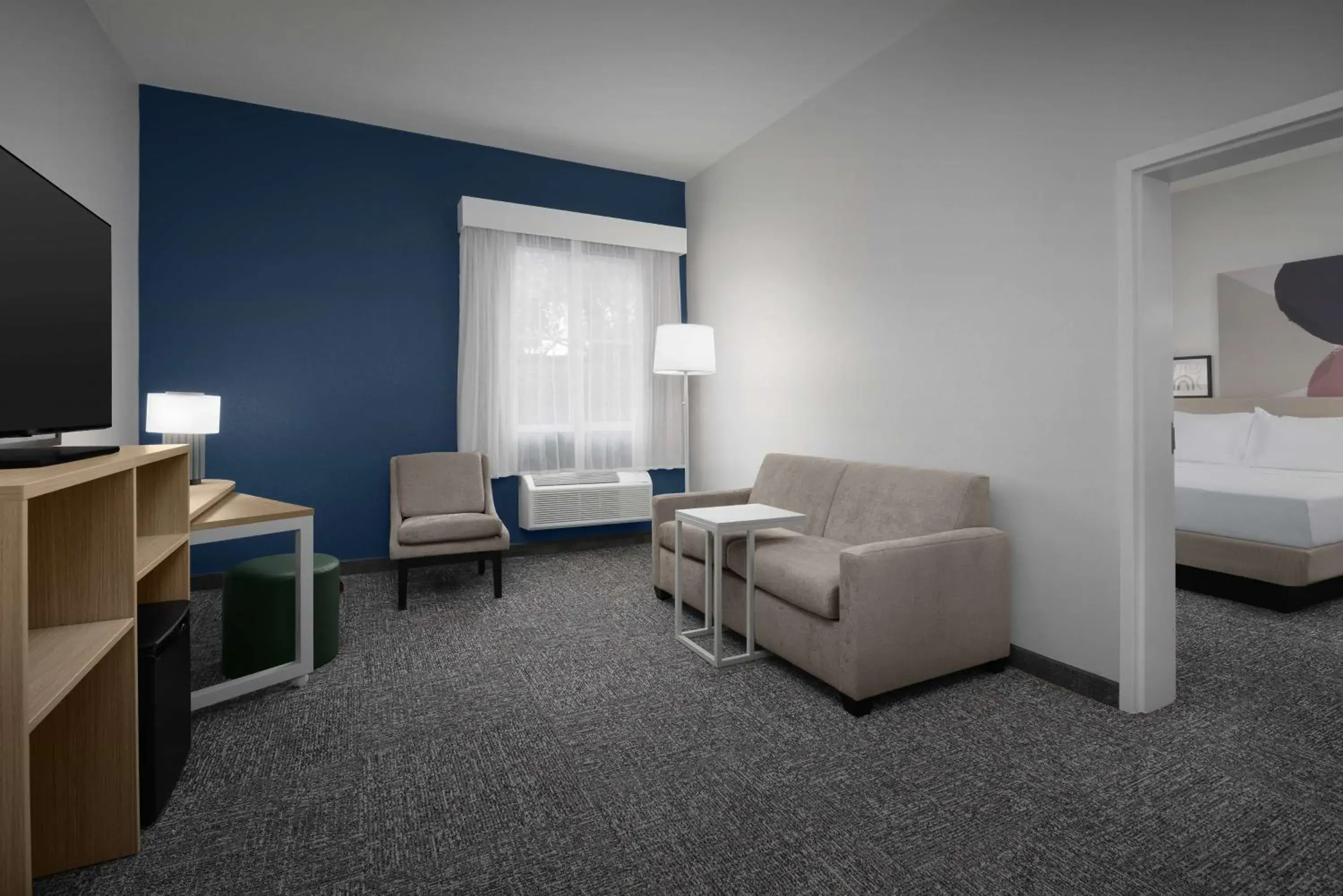 Living room, Bed in Spark by Hilton Miami Doral Living room, Bed in Spark by Hilton Miami Doral