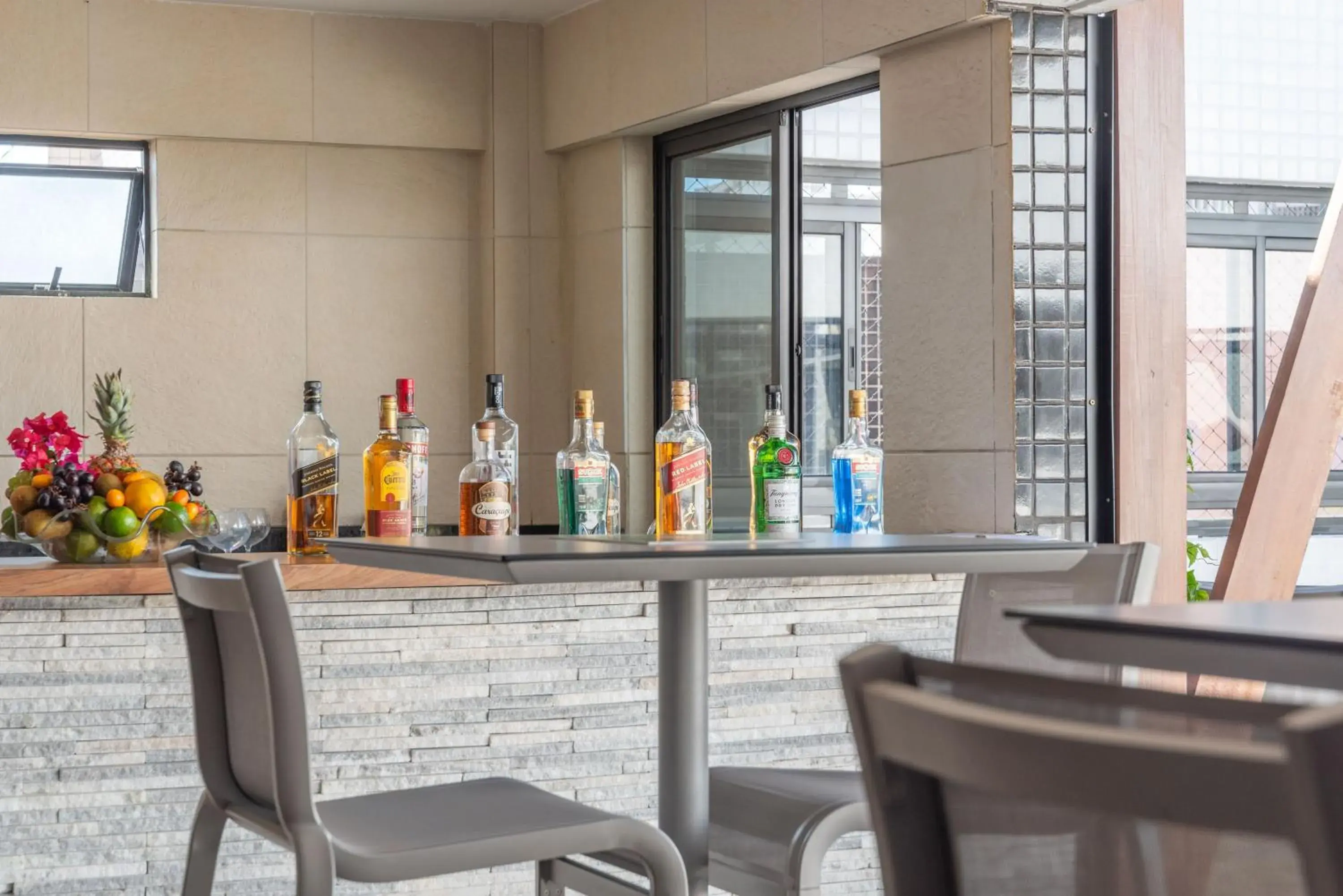 Lounge or bar in Palms Ponta Verde by Tropicalis Lounge or bar in Palms Ponta Verde by Tropicalis