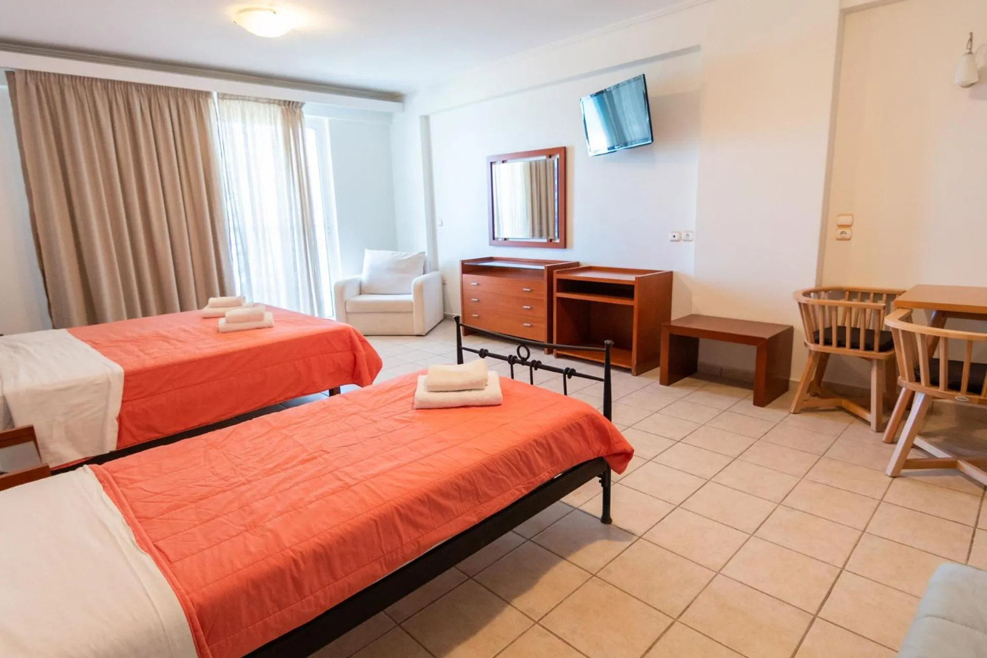 Bed in Hotel Grand Nefeli