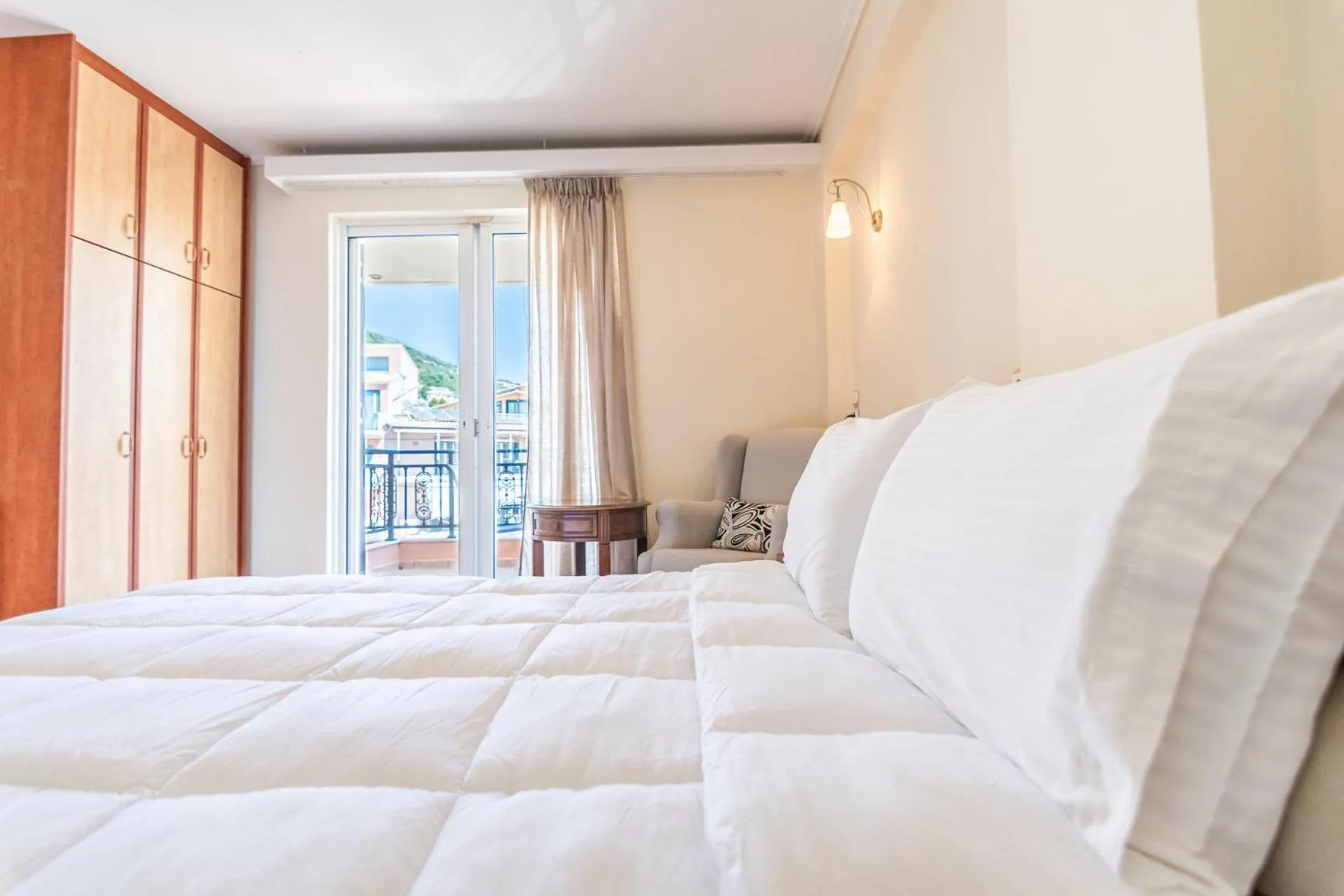 Bed in Hotel Grand Nefeli