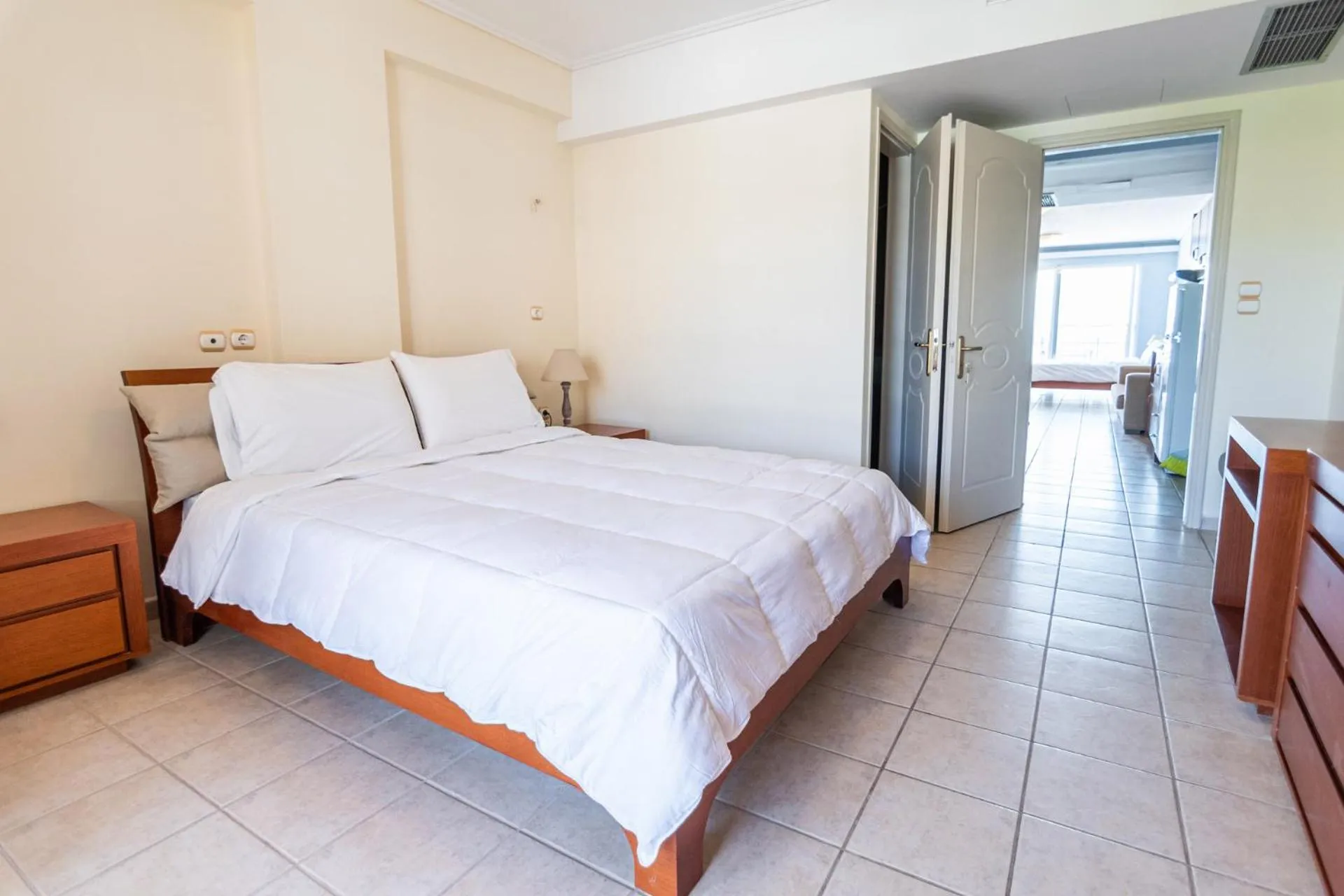 Bed in Hotel Grand Nefeli