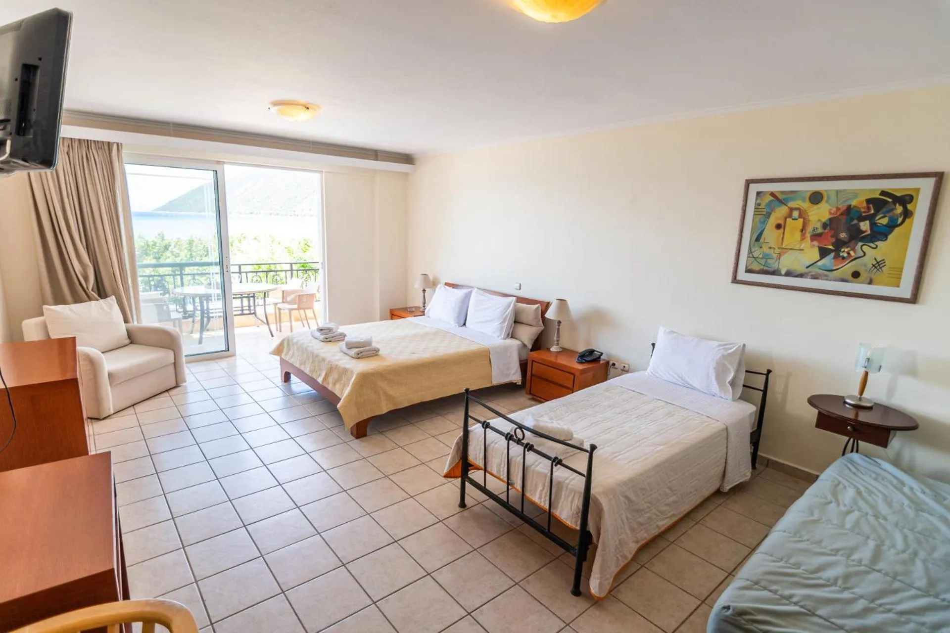 Bed in Hotel Grand Nefeli