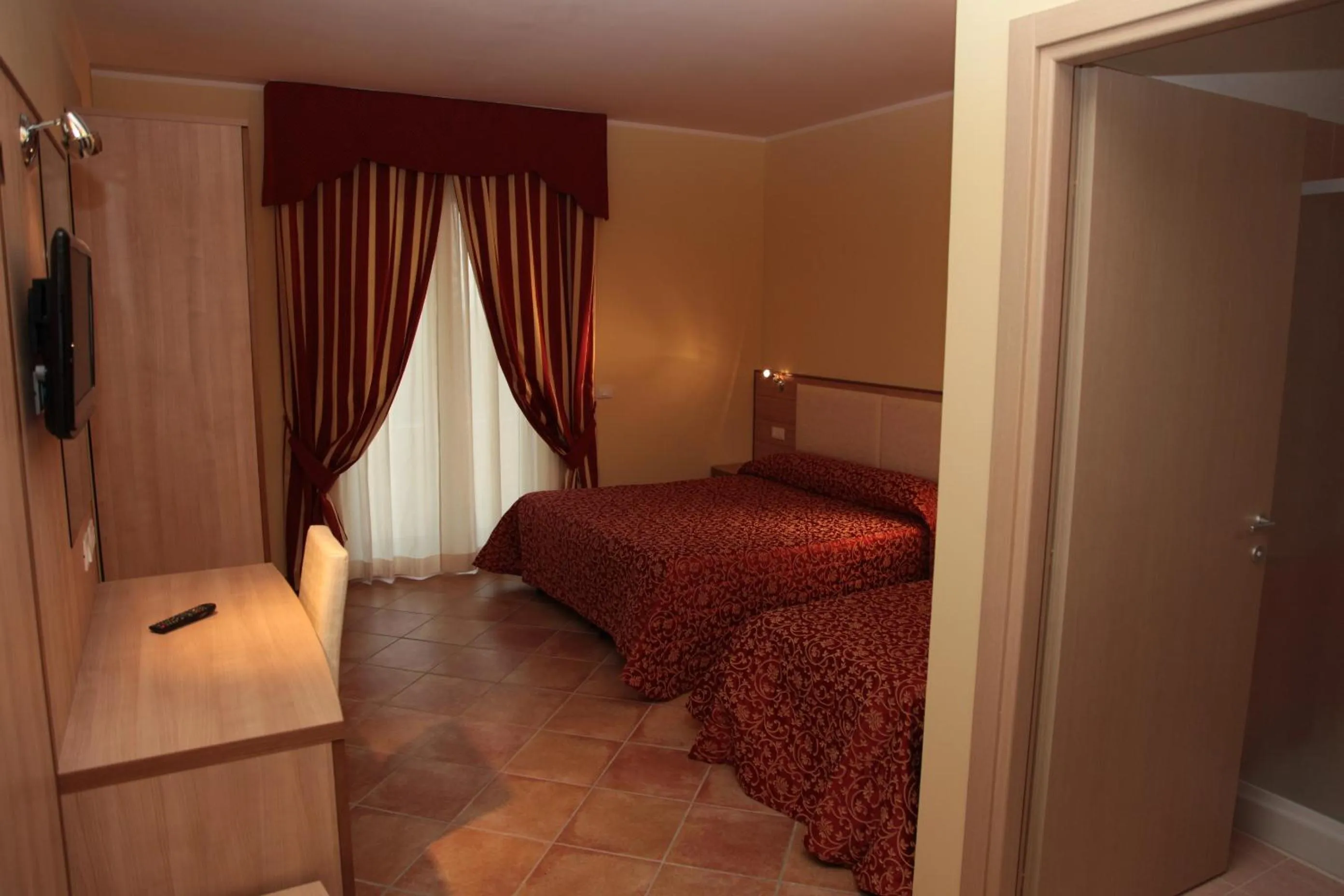 Decorative detail, Bed in Hotel Eden Sul Lago