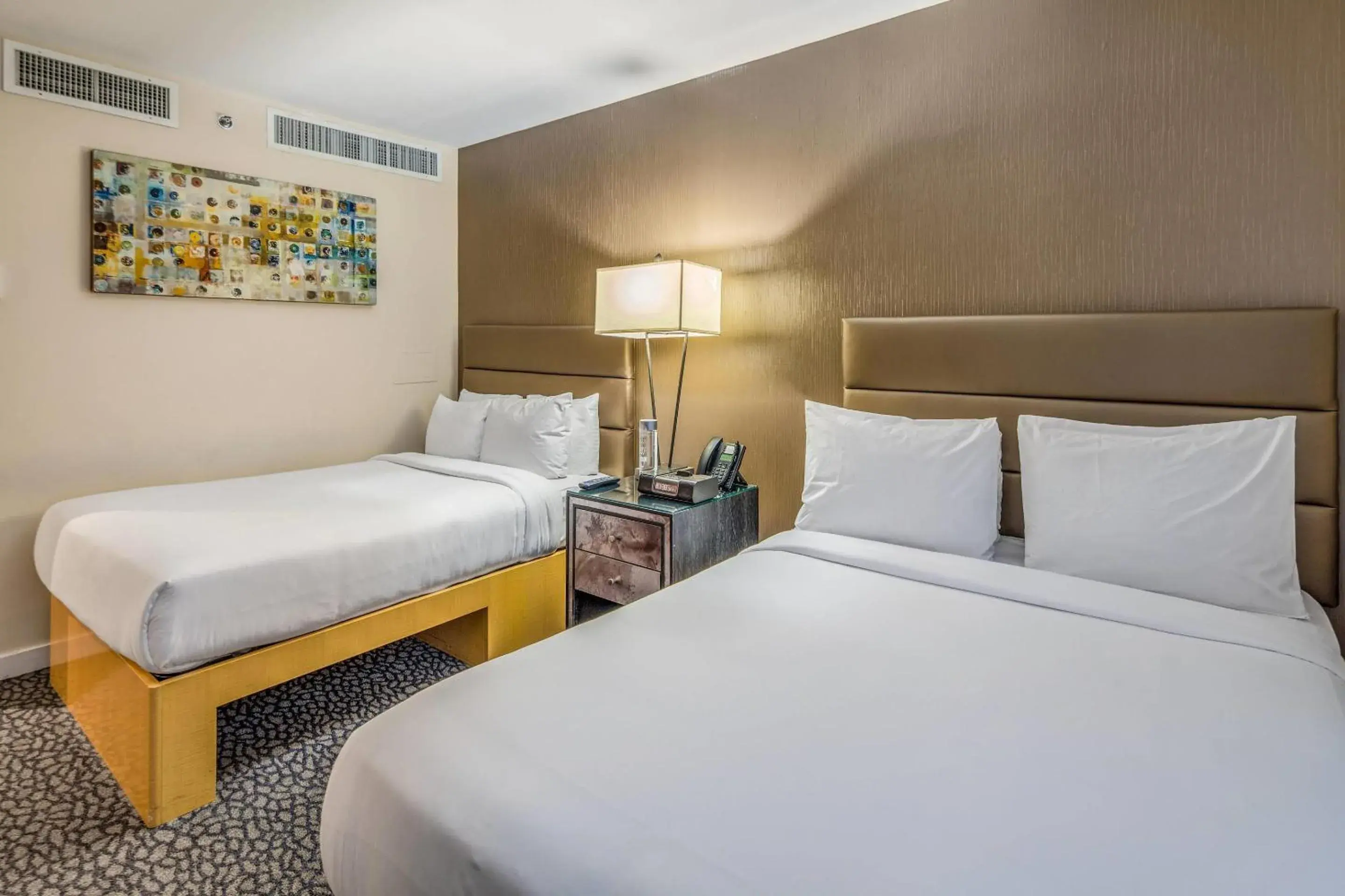 Bedroom in The Historic Blue Angel Hotel Lexington Ave, an Ascend Collection Bedroom in The Historic Blue Angel Hotel Lexington Ave, an Ascend Collection