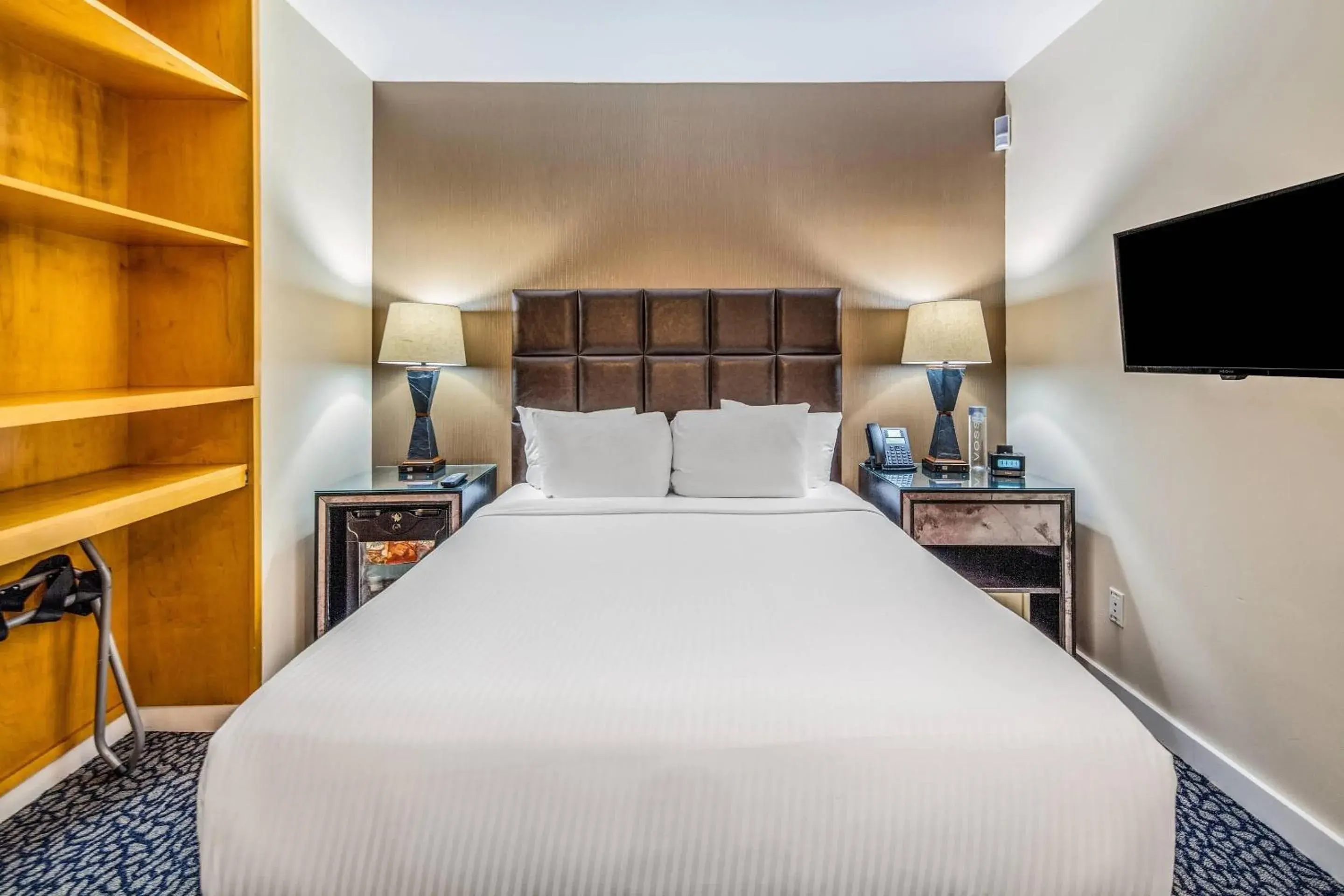 Bedroom in The Historic Blue Angel Hotel Lexington Ave, an Ascend Collection Bedroom in The Historic Blue Angel Hotel Lexington Ave, an Ascend Collection