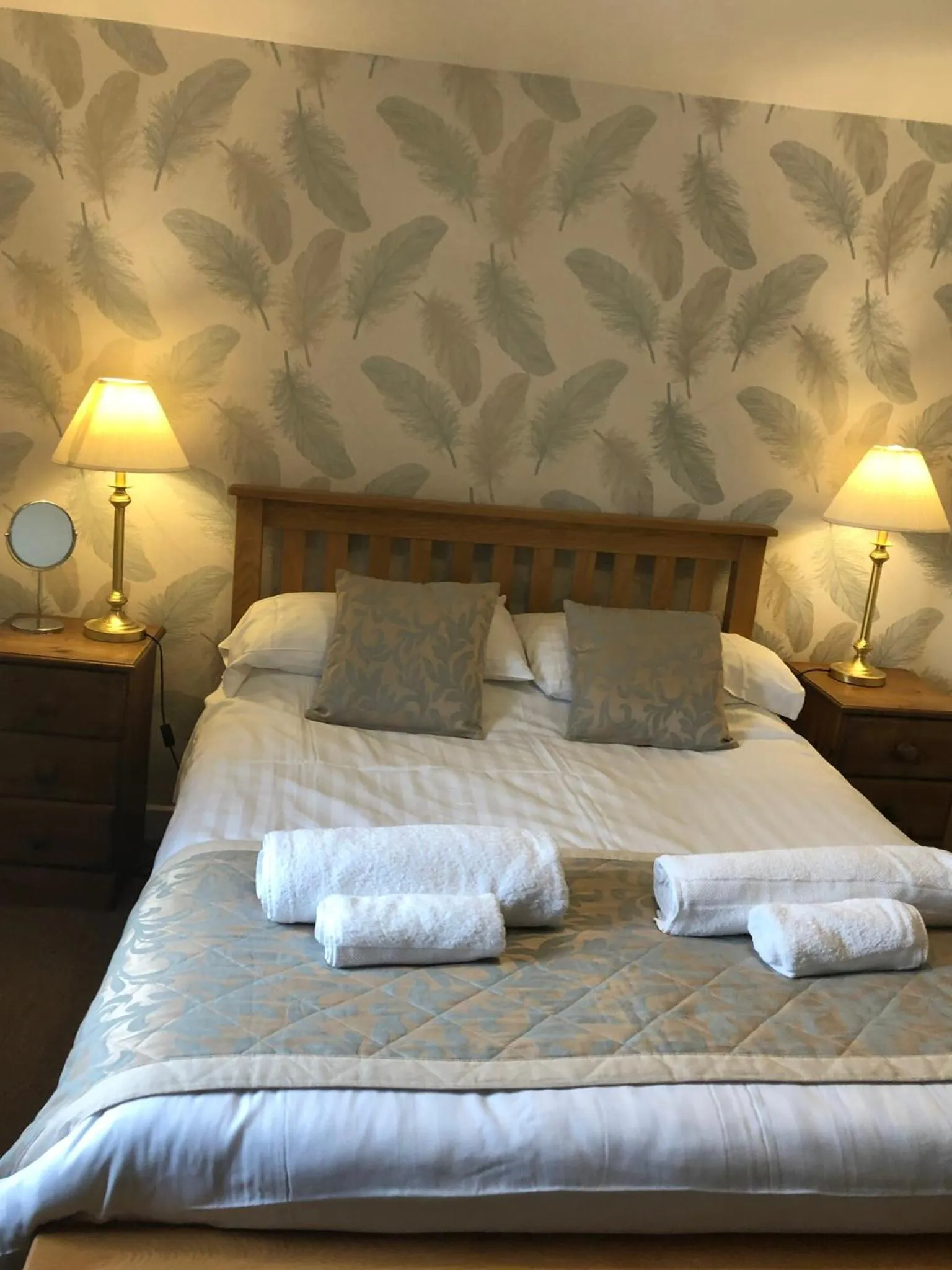 Bed in The Jug & Glass Inn