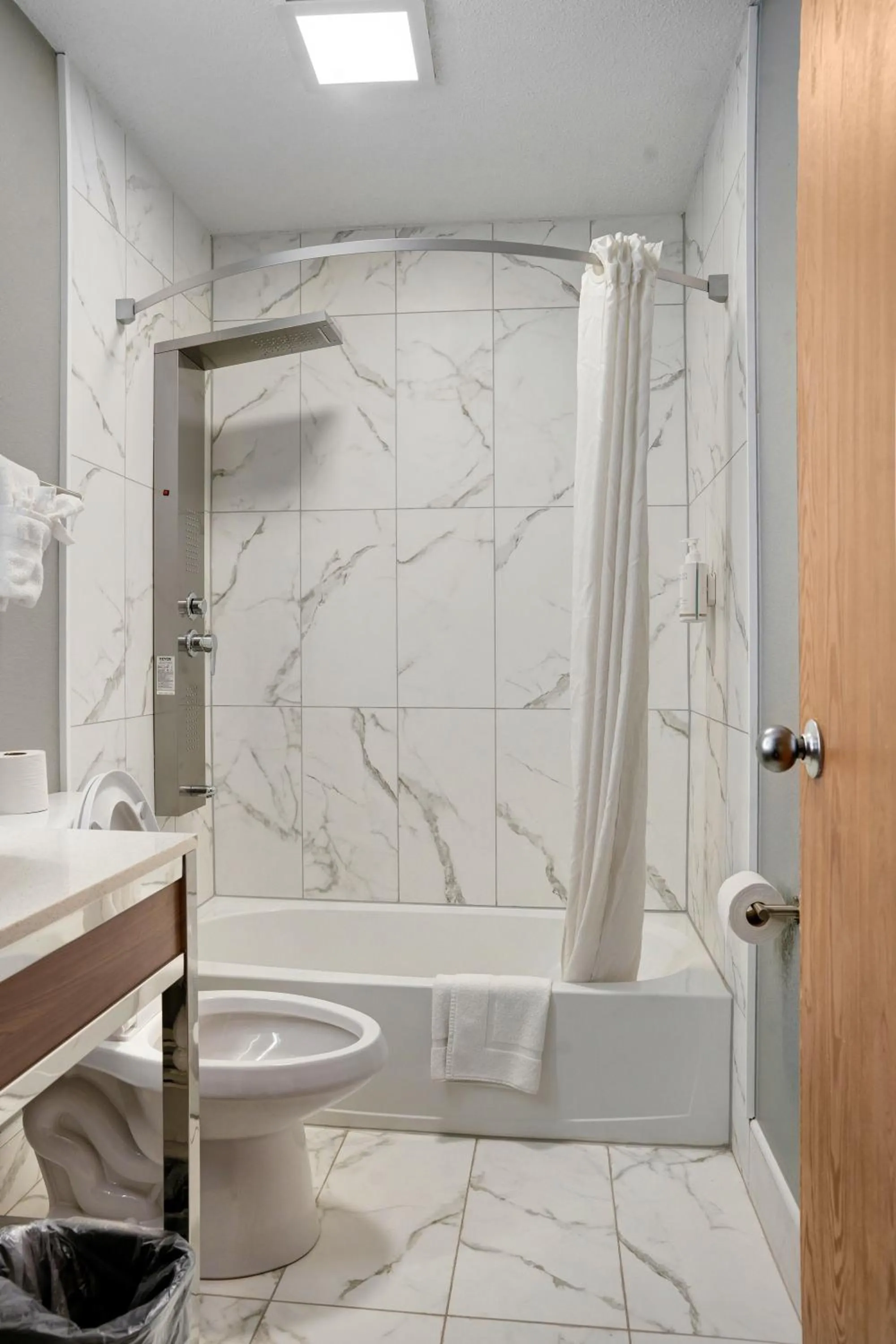 Bathroom in Days Inn by Wyndham Omaha - West Dodge