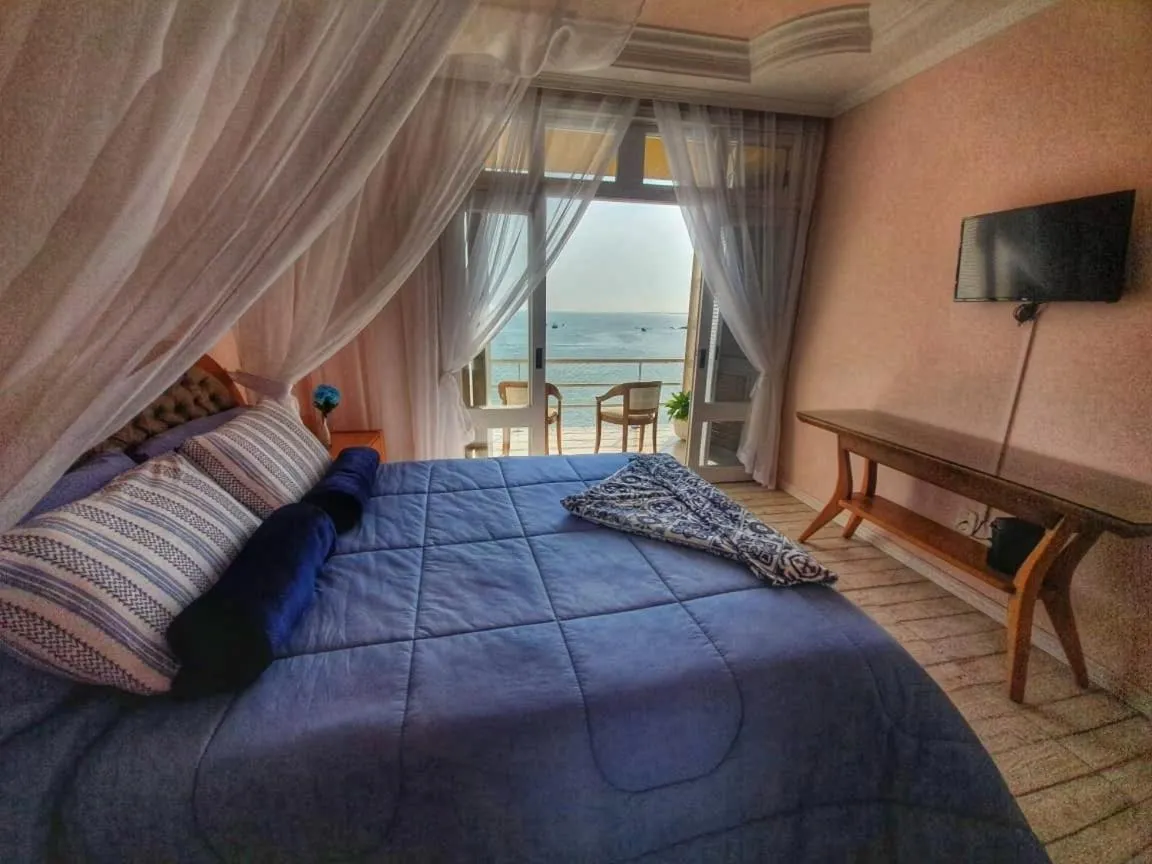Photo of the whole room, Bed in Pousada Pedra das Tartarugas
