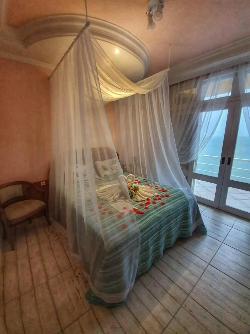 Bed in Pousada Pedra das Tartarugas