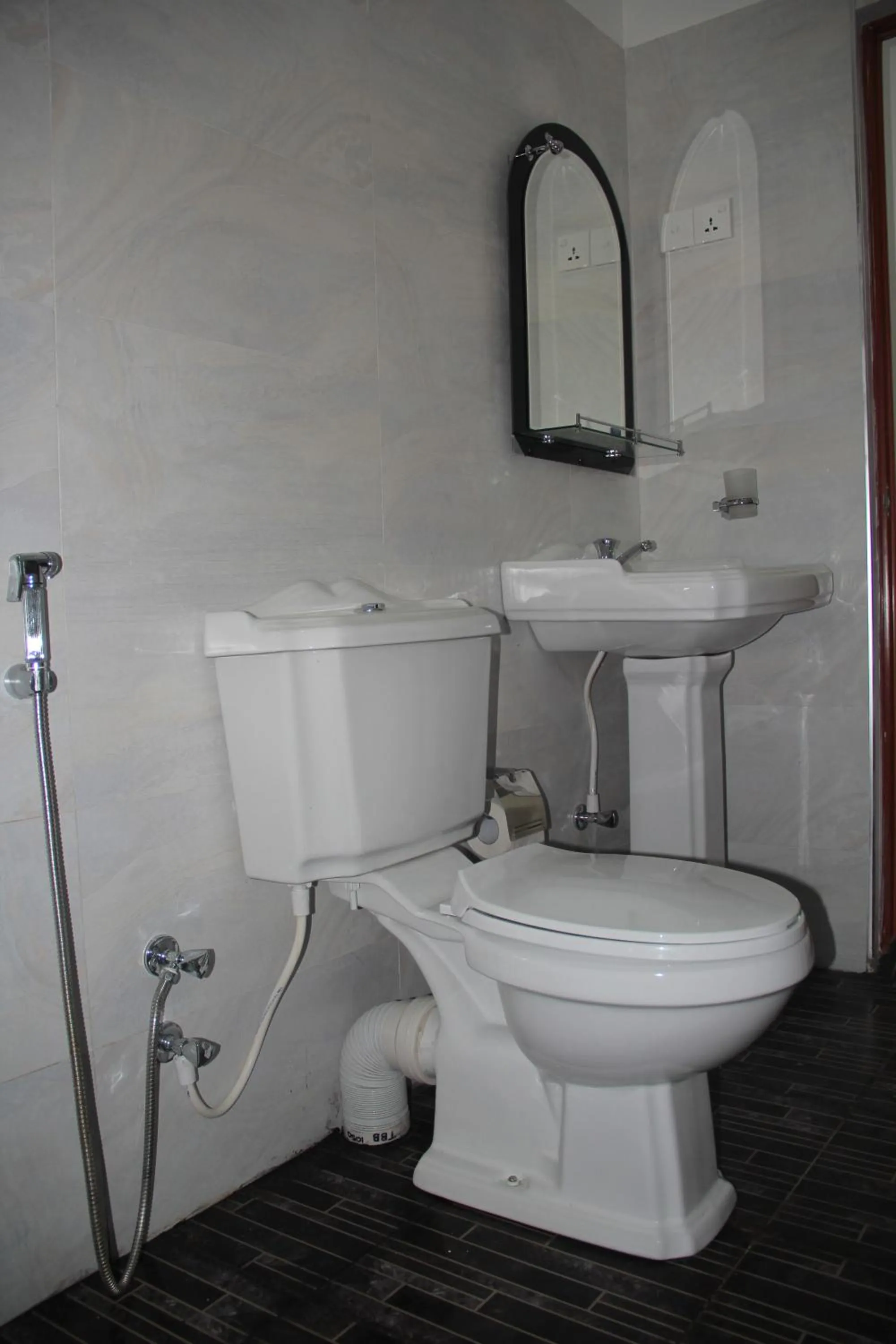 Toilet in Butterfly Homestead Hotel