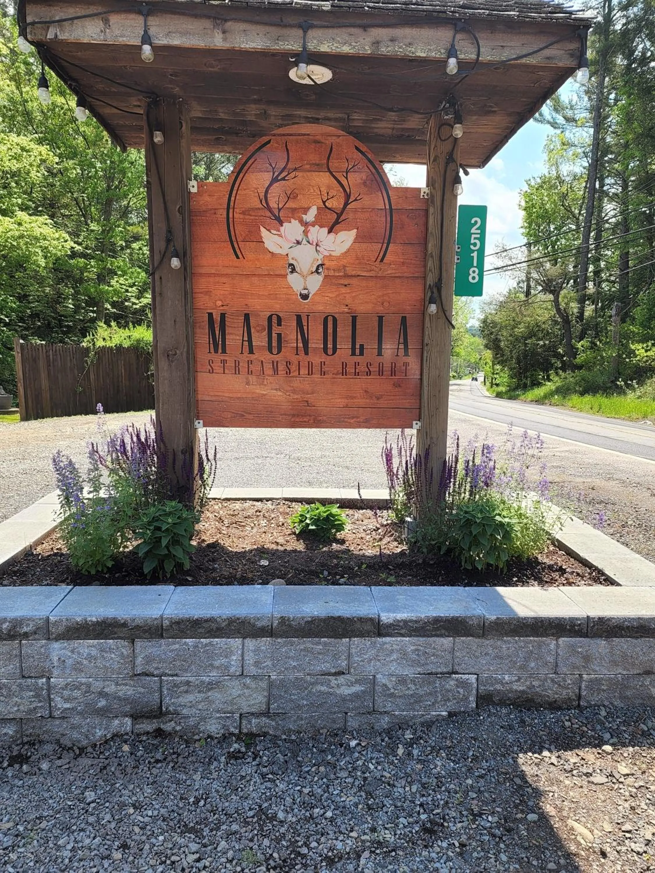 Property logo or sign in Magnolia Streamside Resort