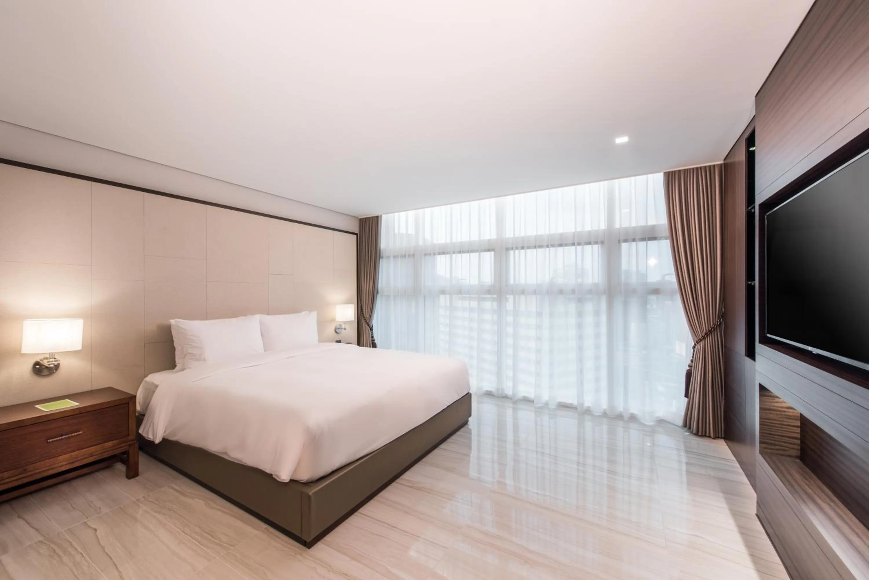 Bed in ENA Suite Hotel Namdaemun