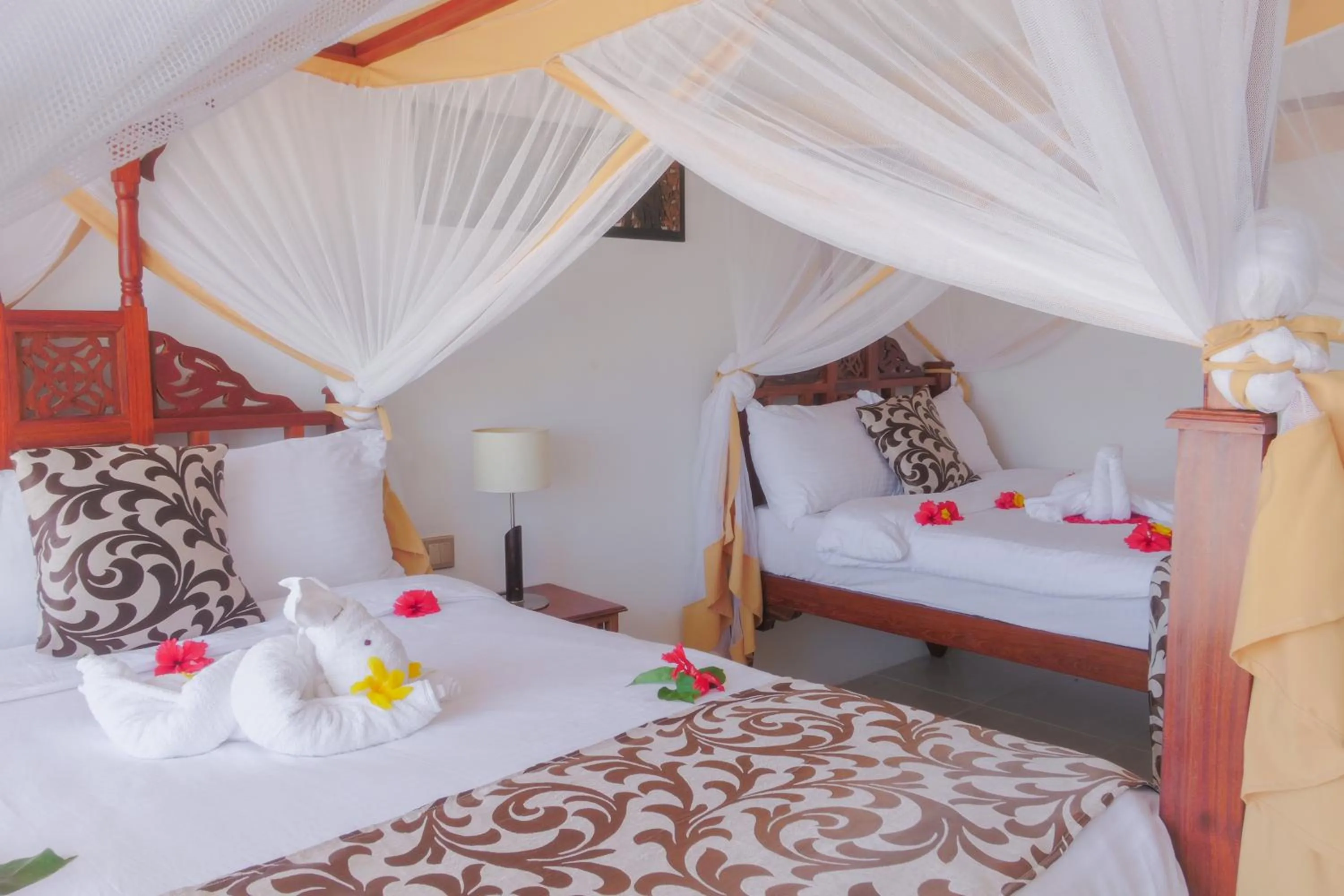 Bed in Isla Bonita Zanzibar Beach Resort