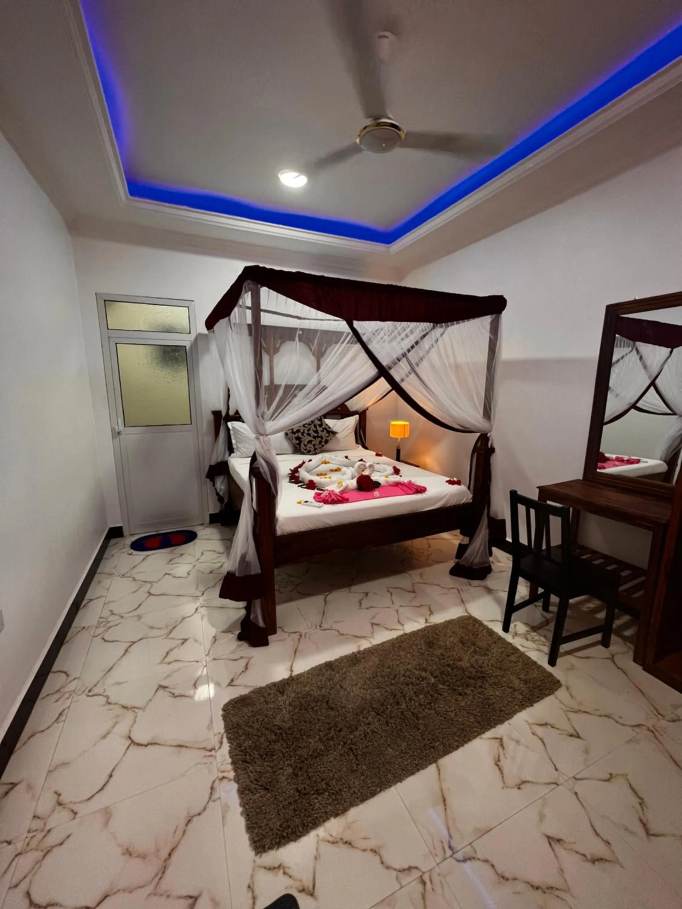 Bed in Isla Bonita Zanzibar Beach Resort