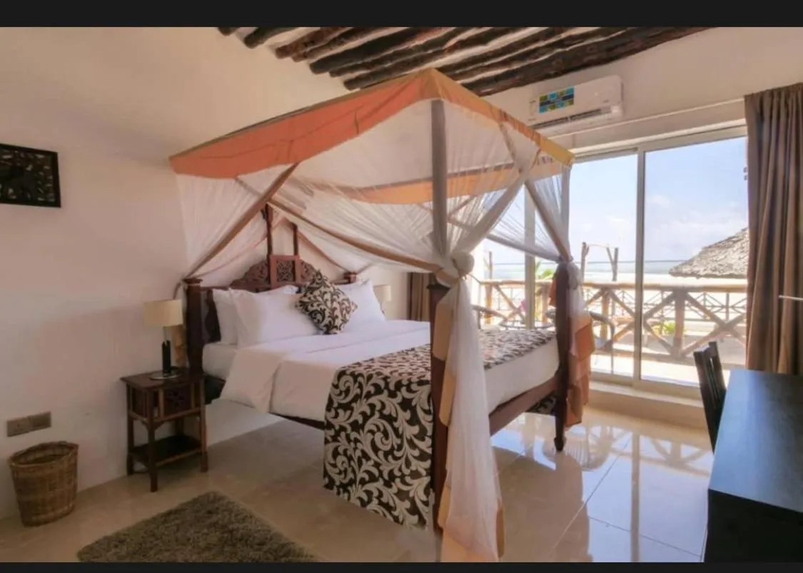 Bed in Isla Bonita Zanzibar Beach Resort