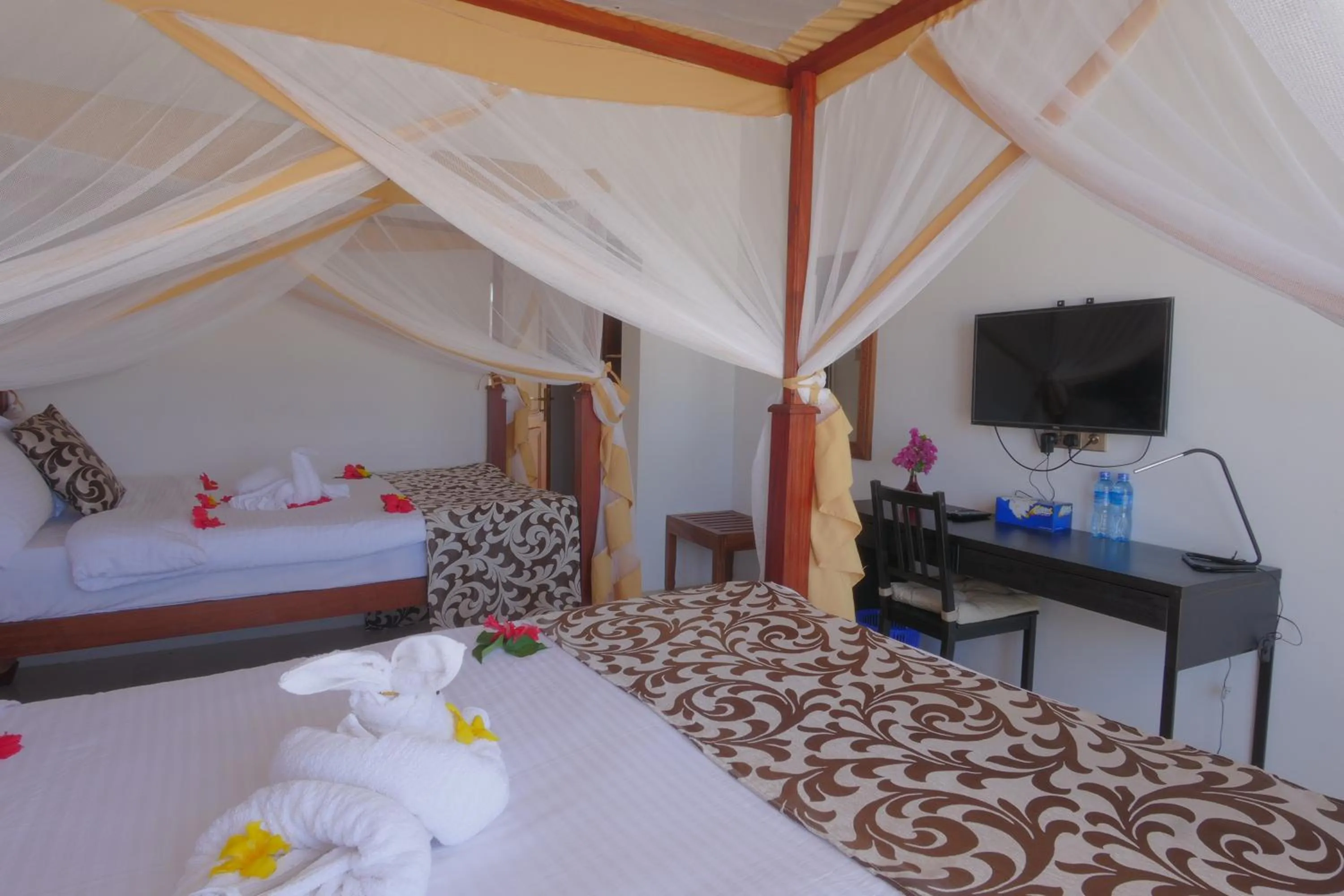 Bed in Isla Bonita Zanzibar Beach Resort