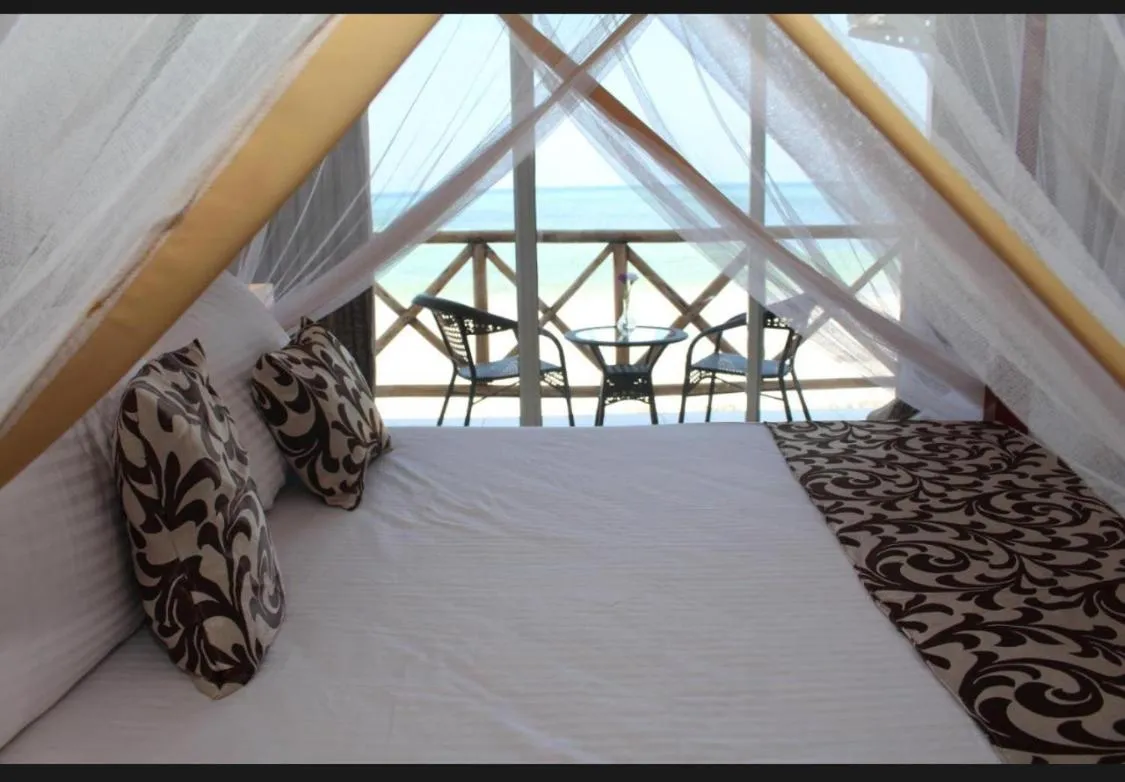 Bed in Isla Bonita Zanzibar Beach Resort