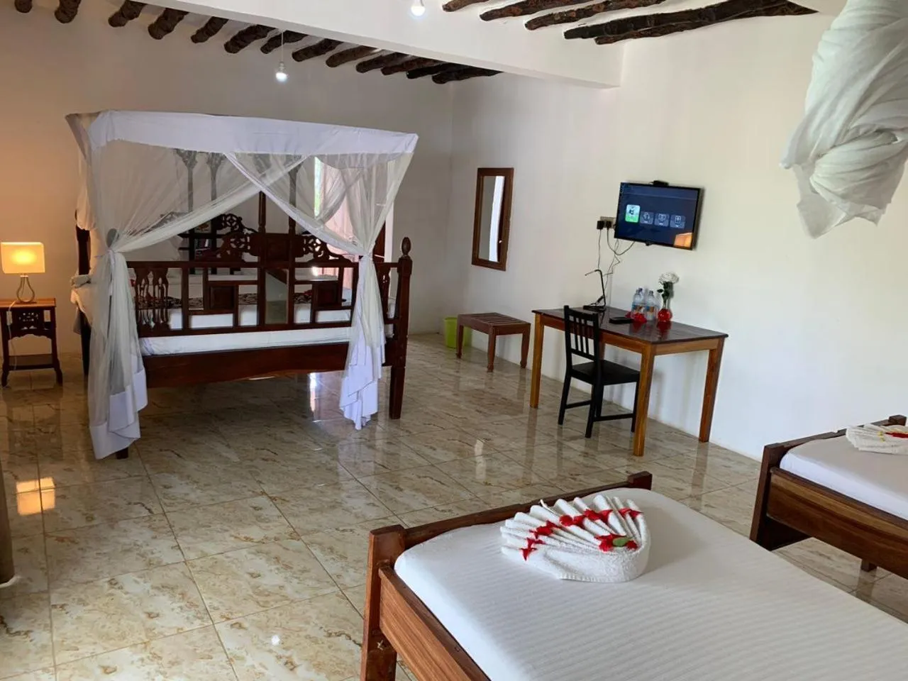Photo of the whole room, Bed in Isla Bonita Zanzibar Beach Resort