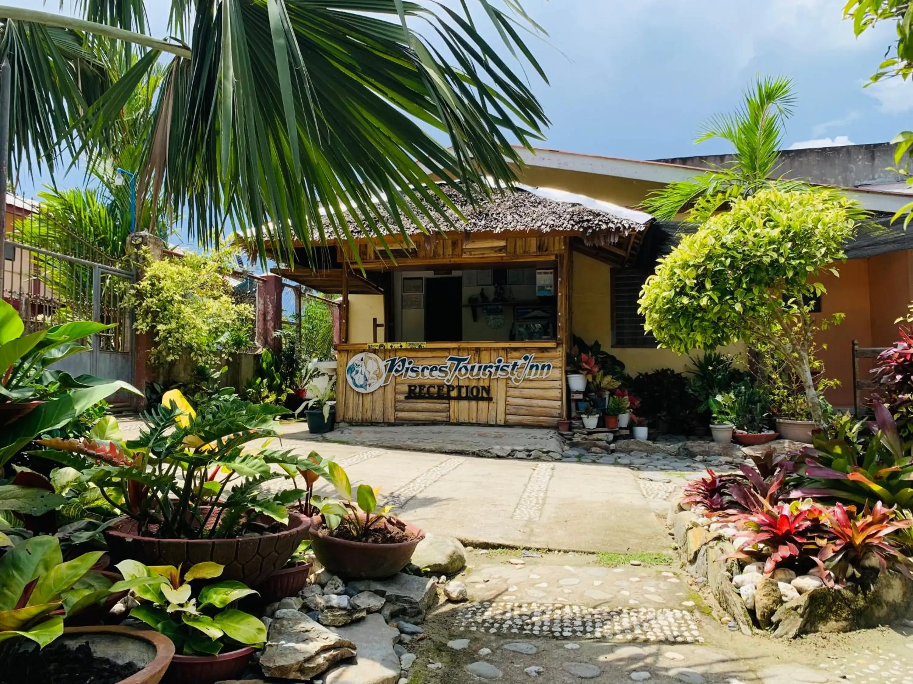 Facade/entrance in Pisces Tourist Inn - Port Barton Facade/entrance in Pisces Tourist Inn - Port Barton