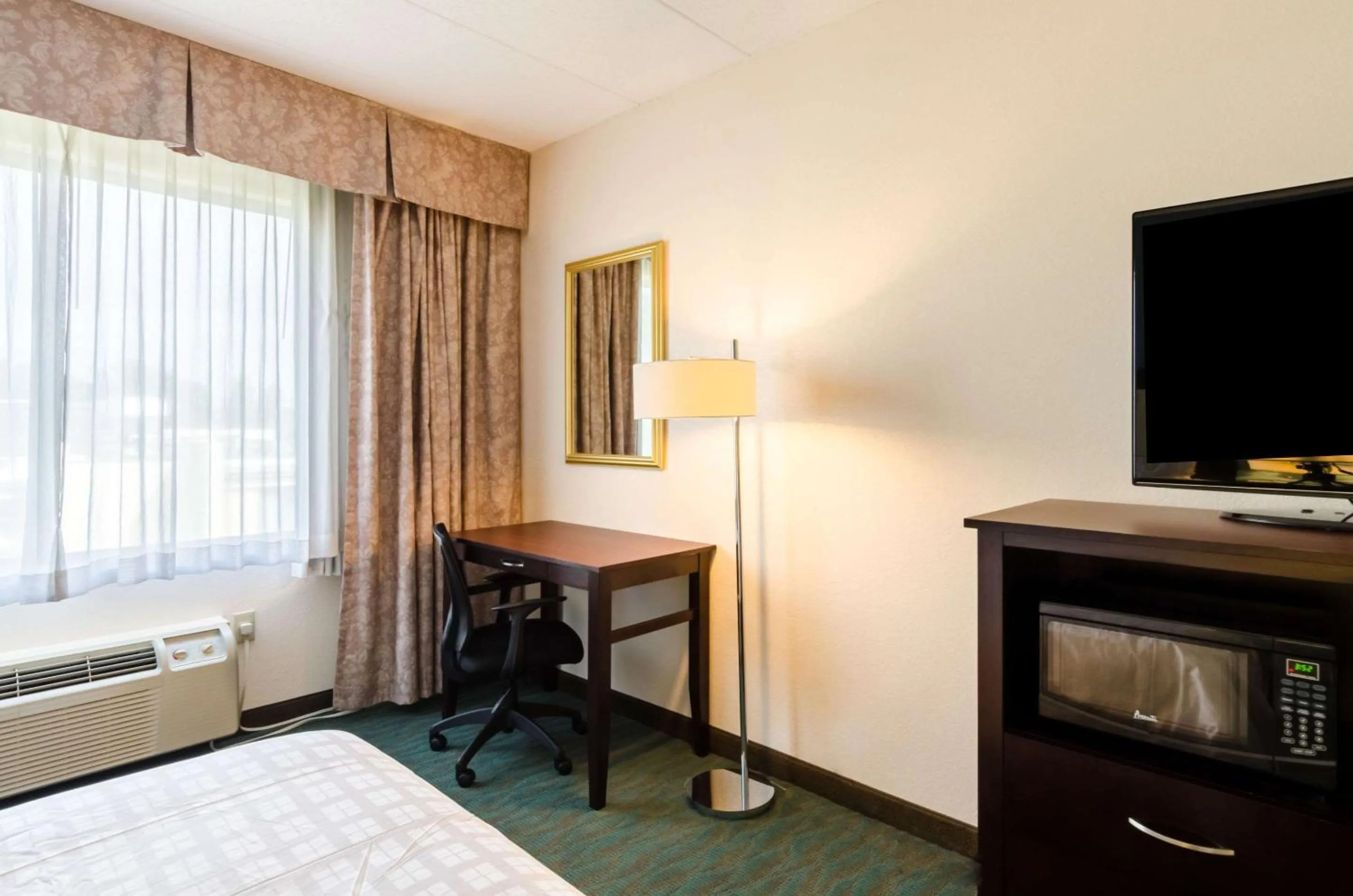 Photo of the whole room, TV/Entertainment Center in Clarion Hotel Aqua Lagoon Waterpark