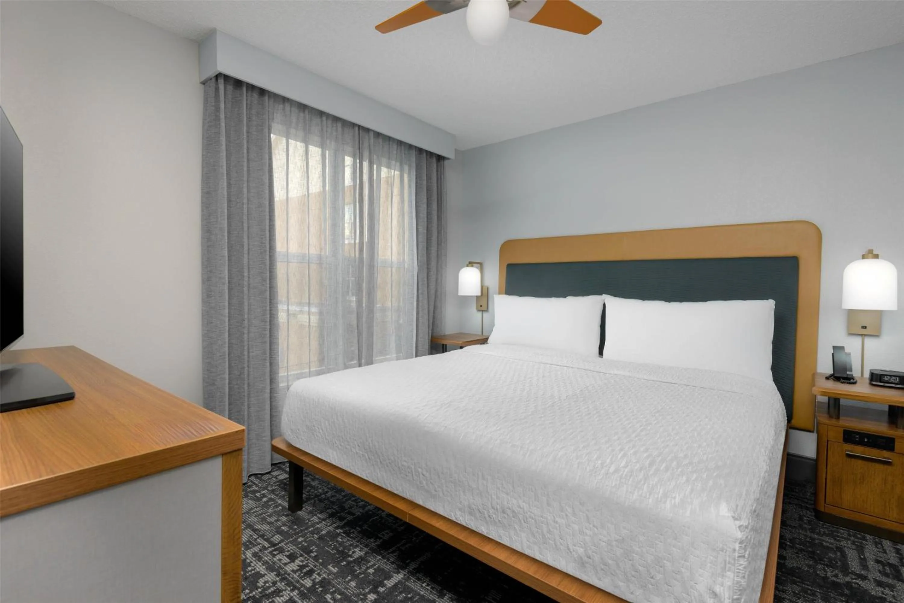 Bed in Homewood Suites by Hilton Orlando-UCF Area