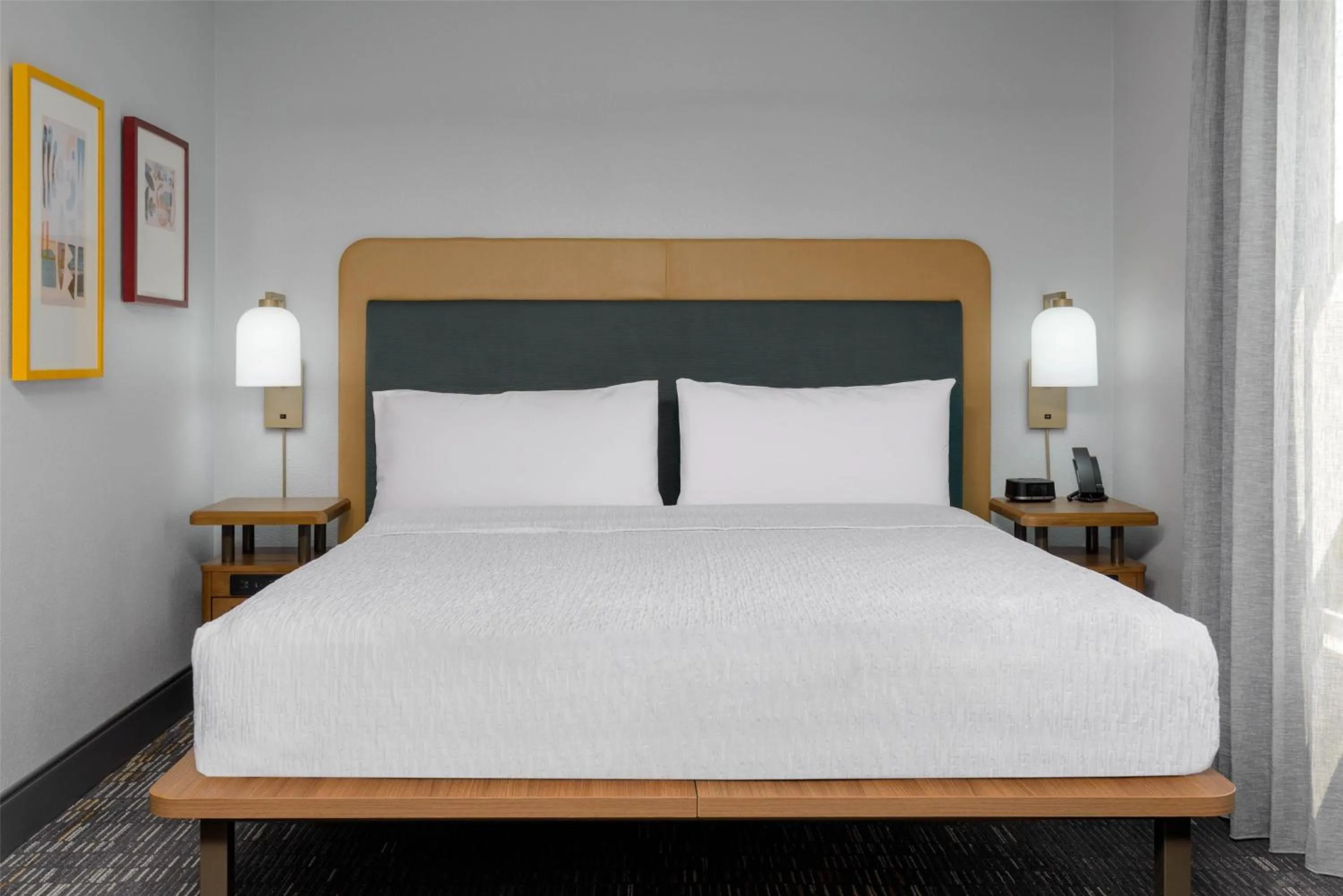 Bed in Homewood Suites by Hilton Orlando-UCF Area