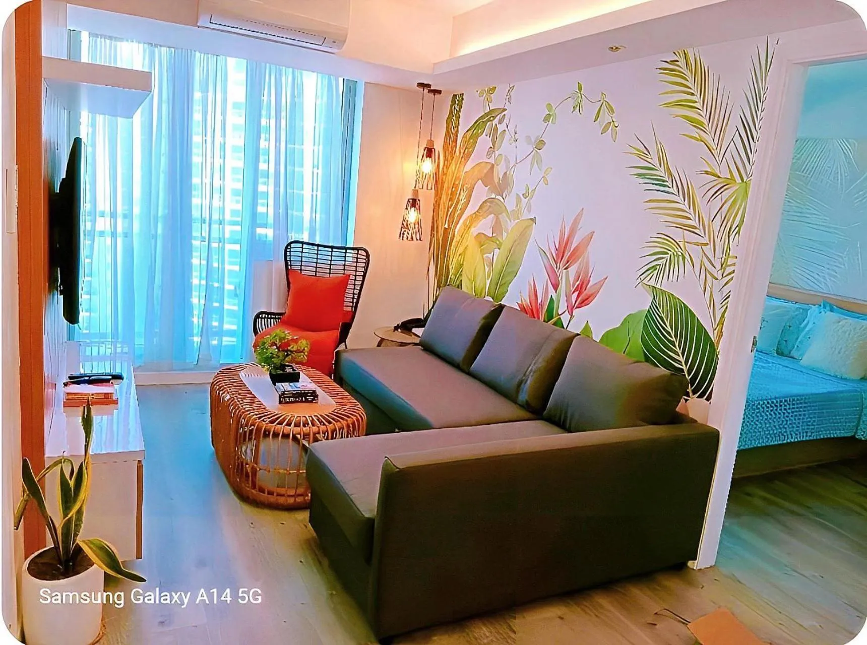 Communal lounge/ TV room in Holiday Escape Philippines