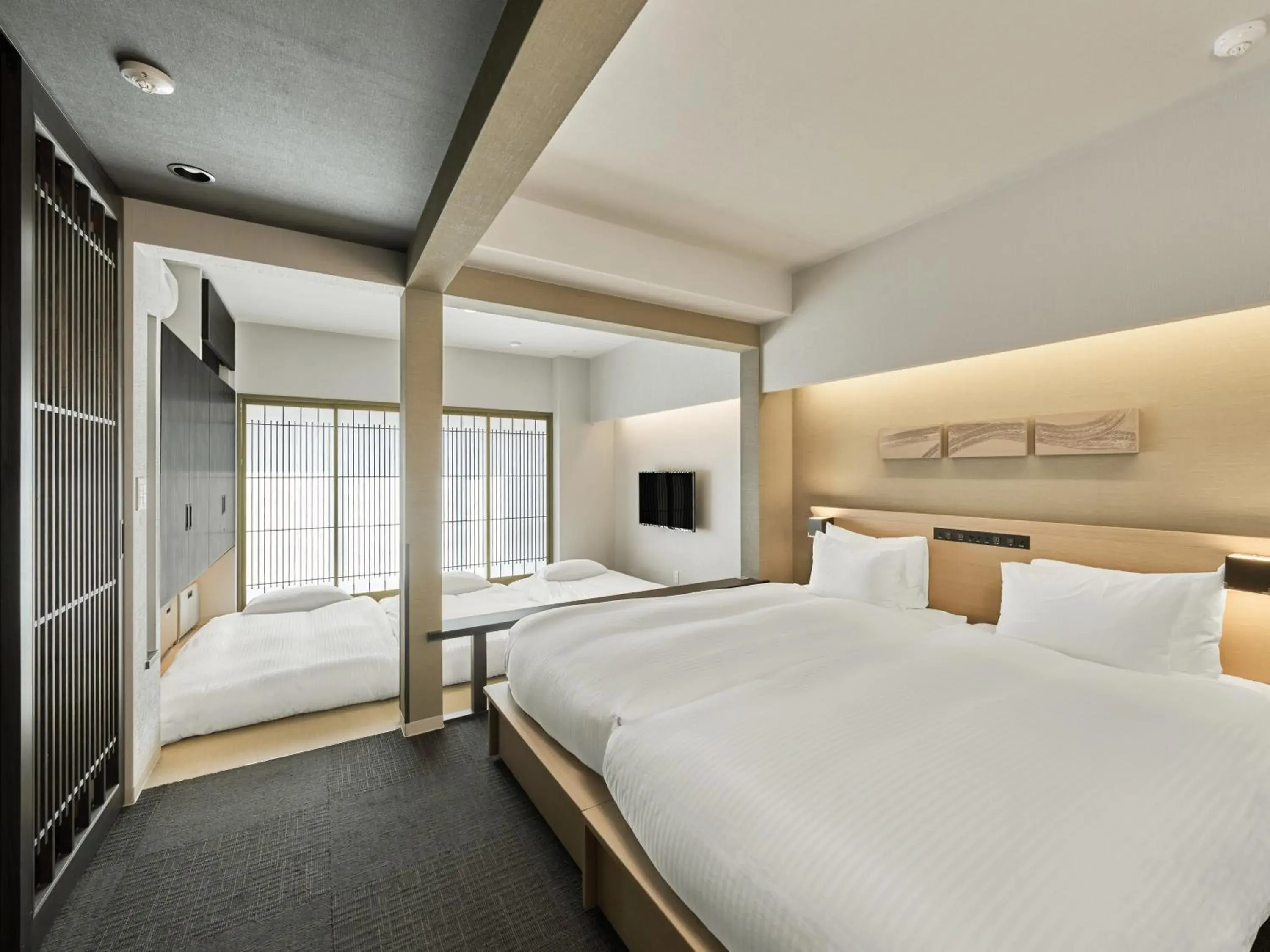 Bed in MIMARU Kyoto Nijo Castle Bed in MIMARU Kyoto Nijo Castle